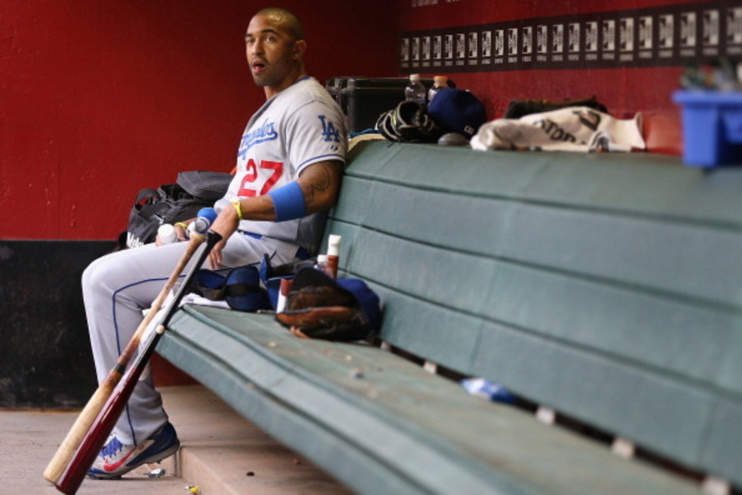 PHOENIX, AZ - MAY 16: Matt Kemp #27 of the Los Angeles Dodgers in the dugout before the MLB game against the Arizona Diamondbacks at Chase Field on May 16, 2014 in Phoenix, Arizona. The Dodgers defeated the Diamondbacks 7-0. (Photo by Christian Peterse PHOENIX, AZ - MAY 16: Matt Kemp #27 of the Los Angeles Dodgers in the dugout before the MLB game against the Arizona Diamondbacks at Chase Field on May 16, 2014 in Phoenix, Arizona. The Dodgers defeated the Diamondbacks 7-0. (Photo by Christian Peterse