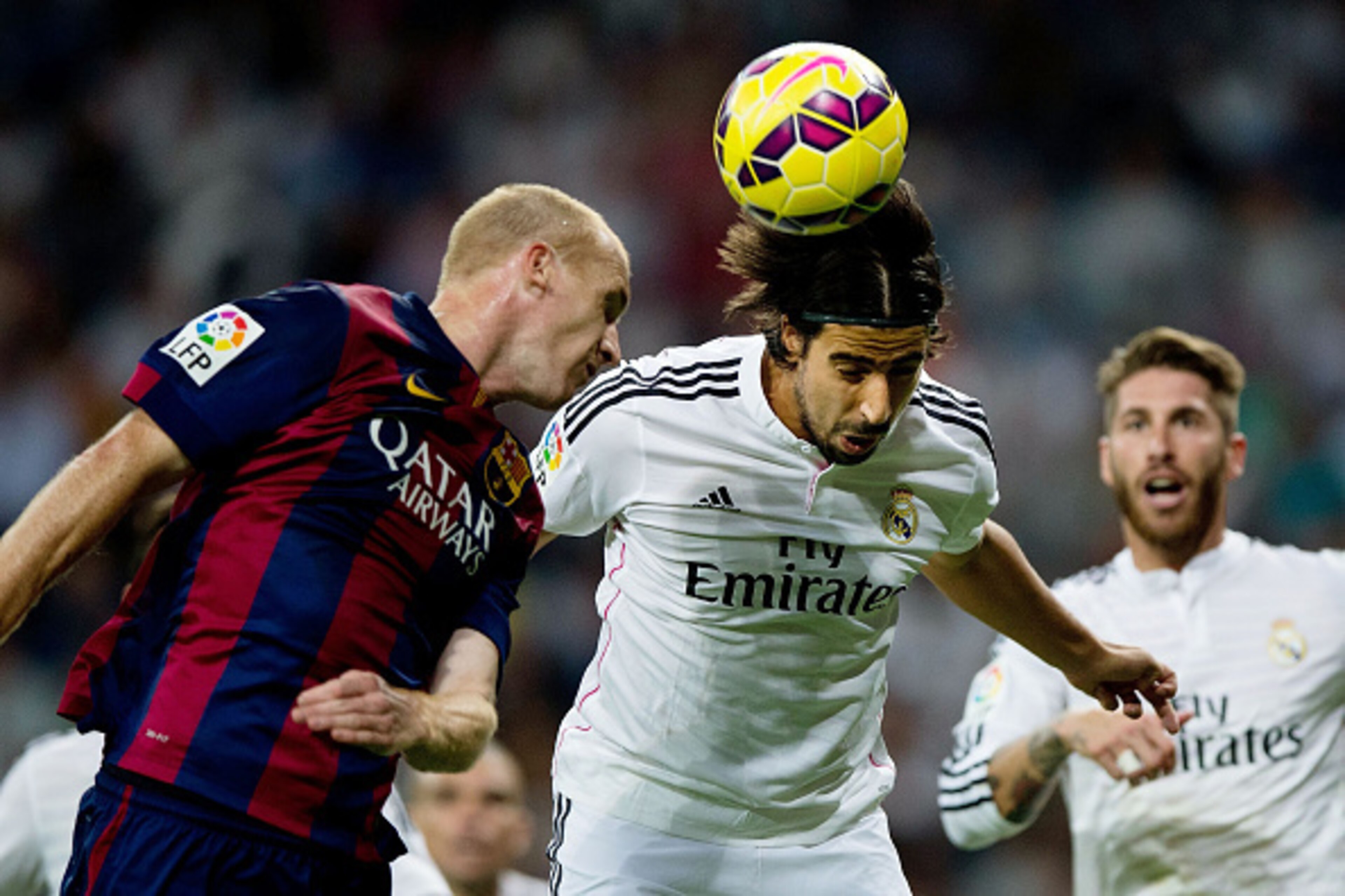 MADRID, SPAIN - OCTOBER 25:  Sami Khedira of Real Madrid CF heads the ball during the La Liga match between Real Madrid CF and FC Barcelona at Estadio Santiago Bernabeu on October 25, 2014 in Madrid, Spain.  (Photo by Gonzalo Arroyo Moreno/Getty Images)