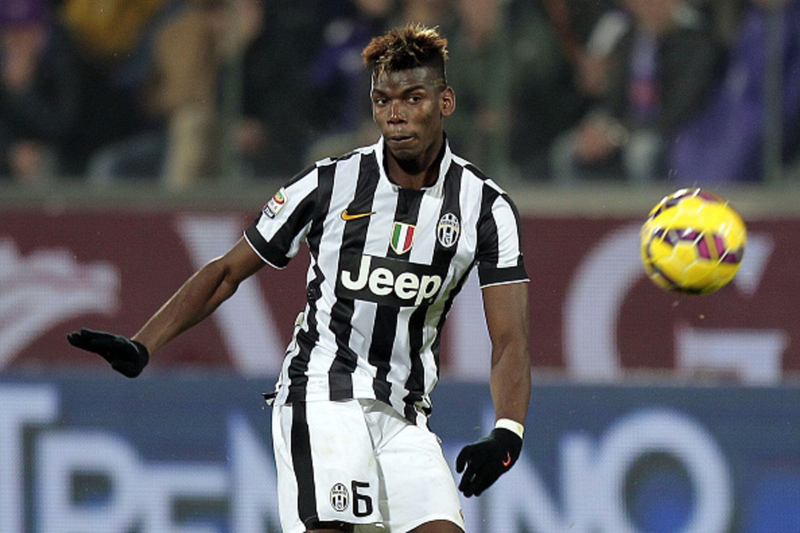 FLORENCE, ITALY - DECEMBER 05: Paul Pogba of Juventus FC in action during the Serie A match between ACF Fiorentina and Juventus FC at Stadio Artemio Franchi on December 5, 2014 in Florence, Italy.  (Photo by Gabriele Maltinti/Getty Images)