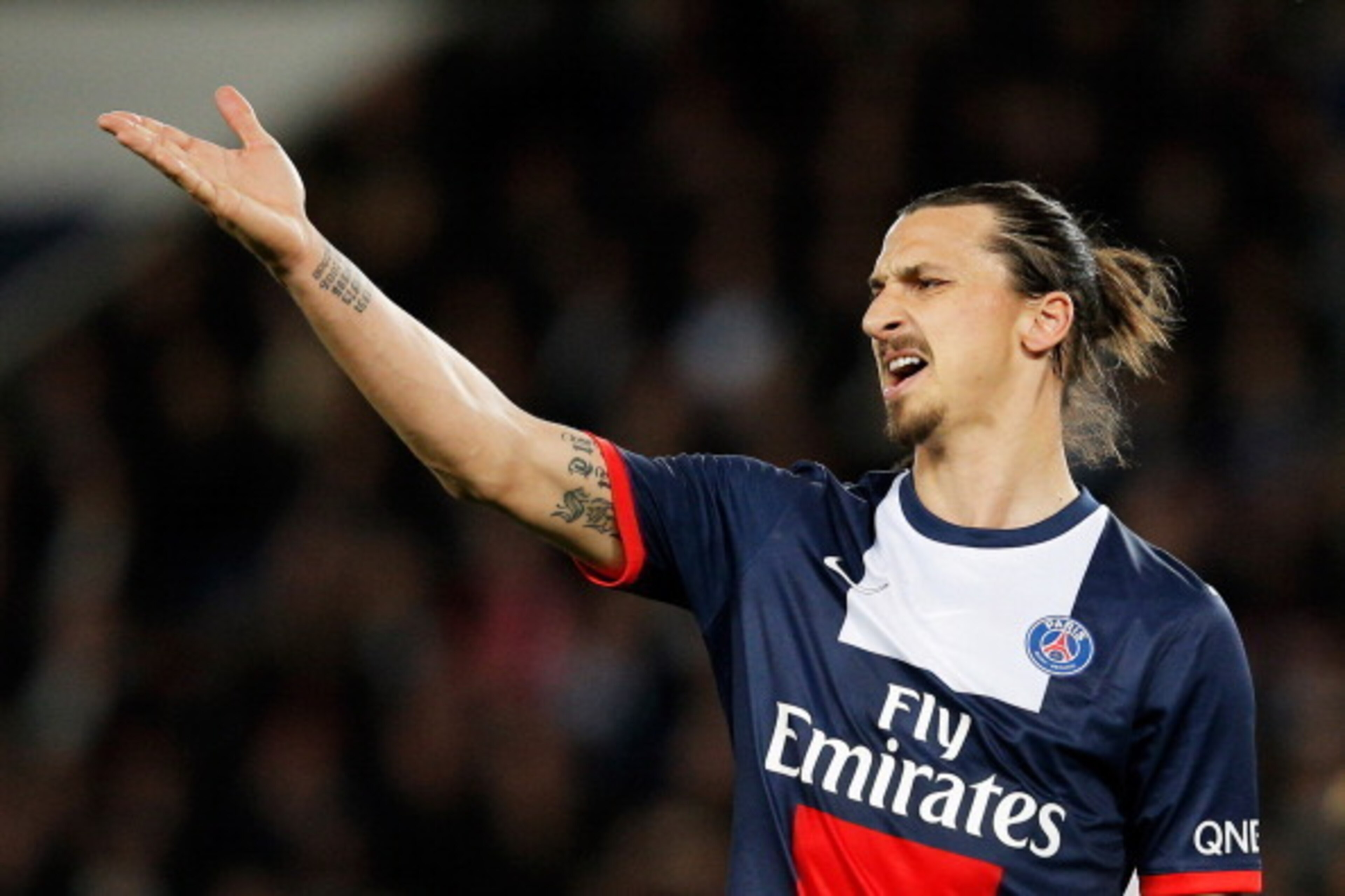 PARIS, FRANCE - MAY 07:  Zlatan Ibrahimovic of PSG reacts to a missed chance on goal during the Ligue 1 match between Paris Saint-Germain FC and Stade Rennais FC at Parc des Princes on May 7, 2014 in Paris, France.  (Photo by Dean Mouhtaropoulos/Getty Ima