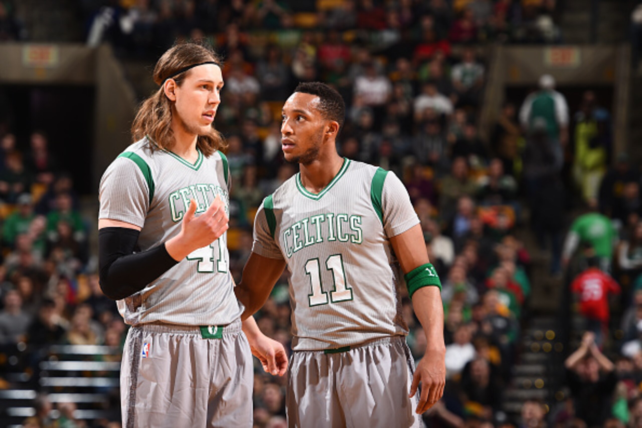 BOSTON, MA - NOVEMBER 28:  Kelly Olynyk #41 of the Boston Celtics talks with teammate Evan Turner #11 during the game against the Chicago Bulls on November 28, 2014 at the TD Garden in Boston, Massachusetts. NOTE TO USER: User expressly acknowledges and a