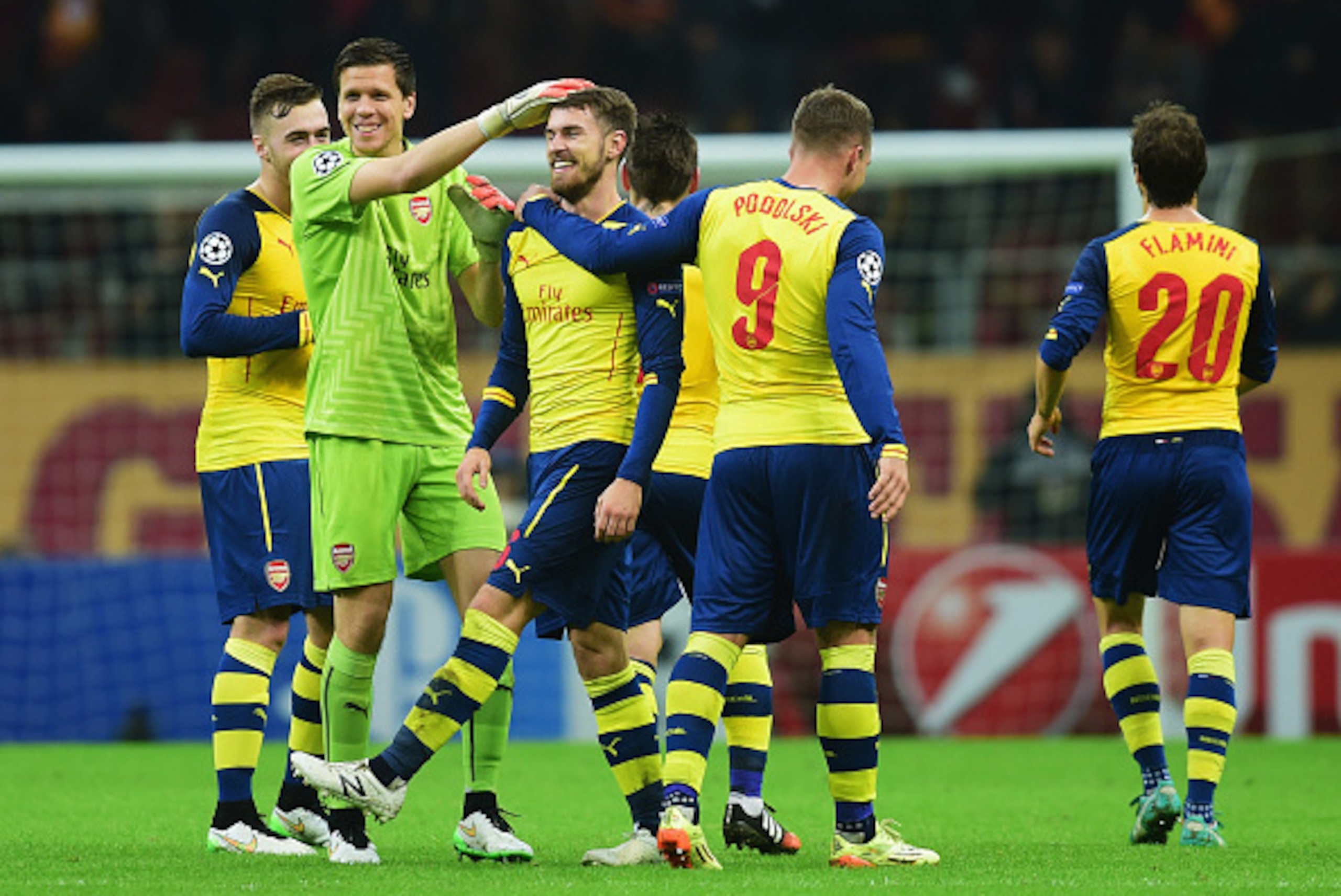 ISTANBUL, TURKEY - DECEMBER 09:  Aaron Ramsey of Arsenal (C) celebrates with team mates as he scores their third goal during the UEFA Champions League Group D match between Galatasaray AS and Arsenal FC at Ali Sami Yen Arena on December 9, 2014 in Istanbu