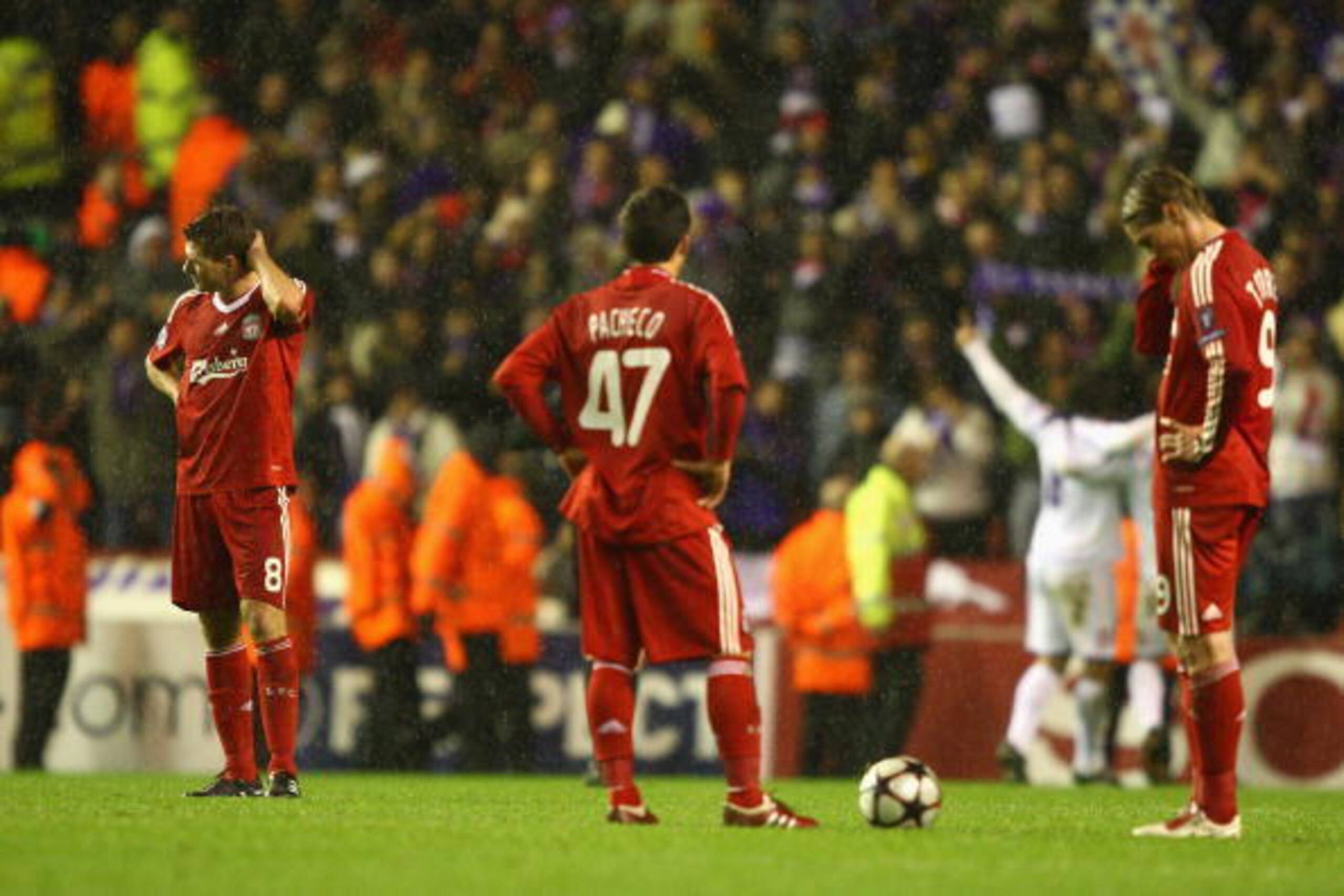 LIVERPOOL, ENGLAND - DECEMBER 09: Steven Gerrard of Liverpool and his team mates prepare to kick off after conceding a second goal during the UEFA Champions League Group E match between Liverpool and Fiorentina at Anfield on December 9, 2009 in Liverpool LIVERPOOL, ENGLAND - DECEMBER 09: Steven Gerrard of Liverpool and his team mates prepare to kick off after conceding a second goal during the UEFA Champions League Group E match between Liverpool and Fiorentina at Anfield on December 9, 2009 in Liverpool