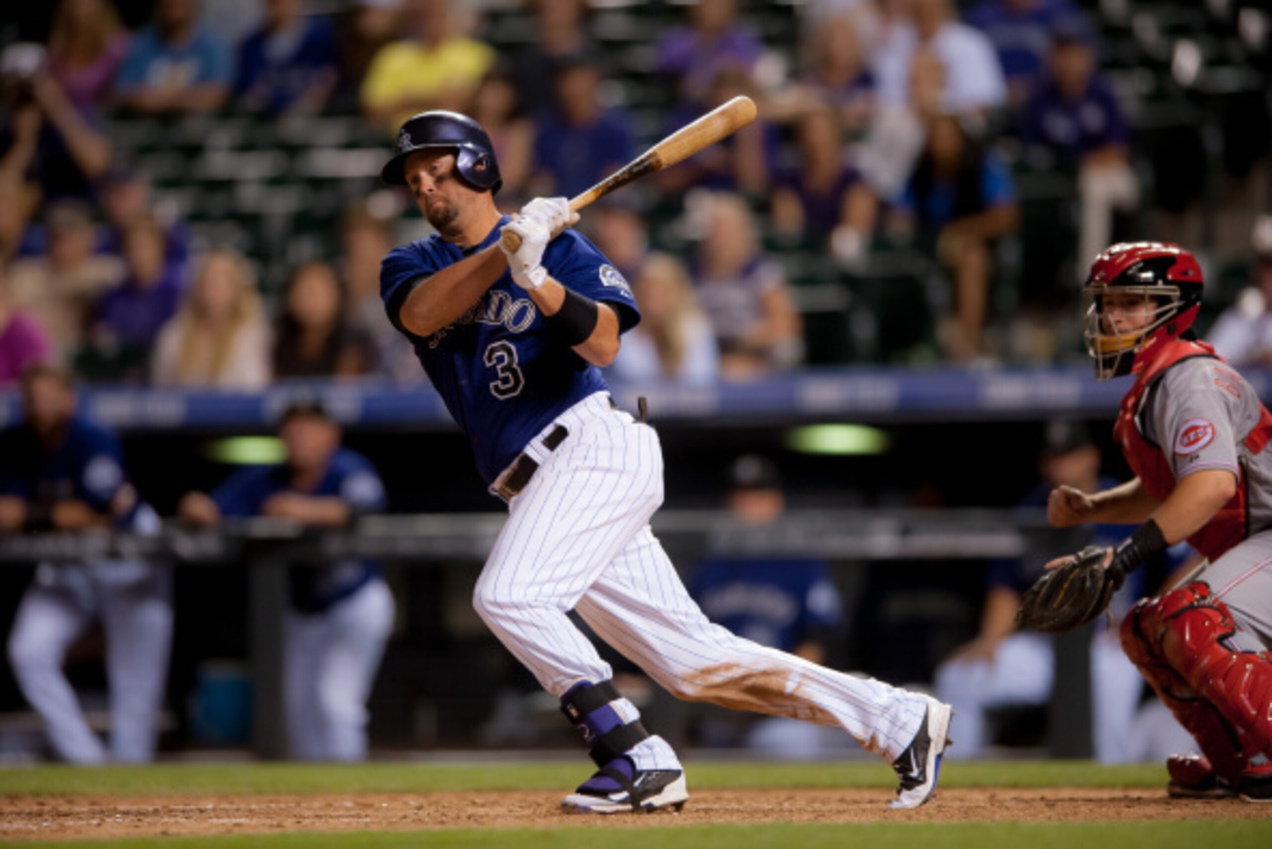 DENVER, CO - AUGUST 17:  Michael Cuddyer #3 of the Colorado Rockies doubles, knocking in two runs and completing the cycle in the eighth inning during the second game of a split double header at Coors Field on August 17, 2014 in Denver, Colorado.  (Photo 