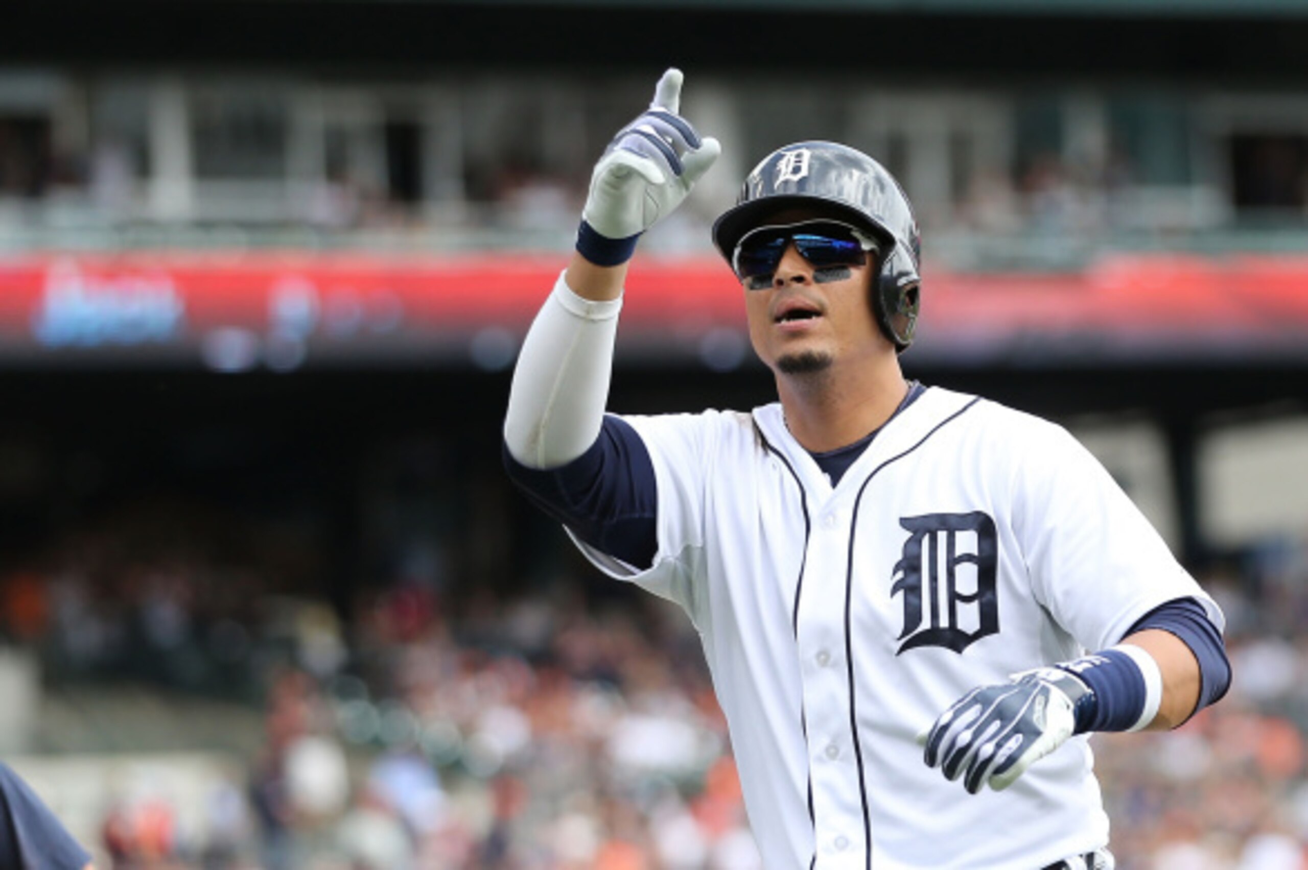 DETROIT, MI - SEPTEMBER 06: Victor Martinez #41 of the Detroit Tigers celebrates after hitting a solo home run to left field during the third inning of the game against the San Francisco Giants at Comerica Park on September 6, 2014 in Detroit, Michigan.  