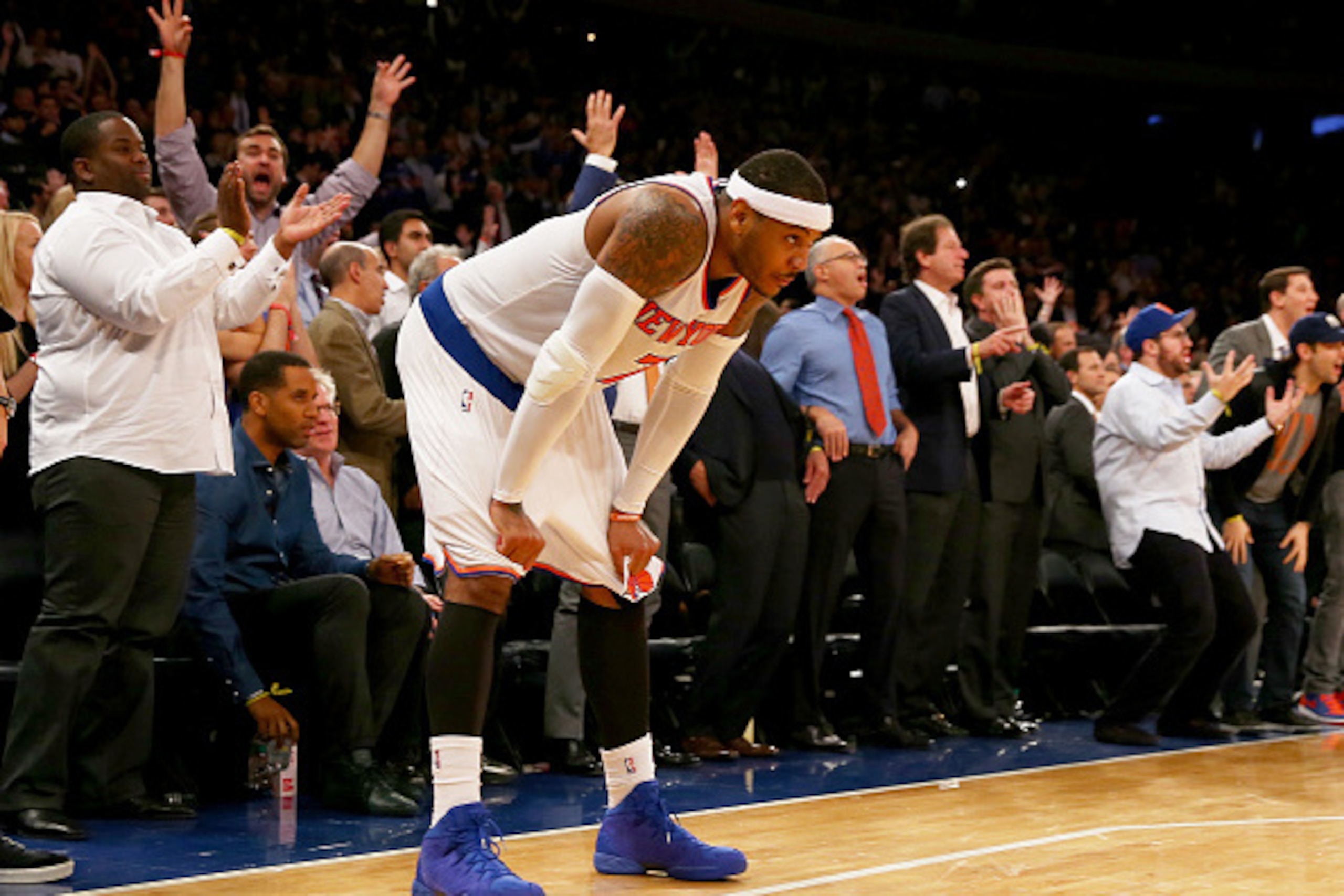 NEW YORK, NY - DECEMBER 04:  Carmelo Anthony #7 of the New York Knicks reacts to the loss as the Cleveland Cavaliers win at Madison Square Garden on December 4, 2014 in New York City.The Cleveland Cavaliers defeated the New York Knicks 90-87.NOTE TO USER: