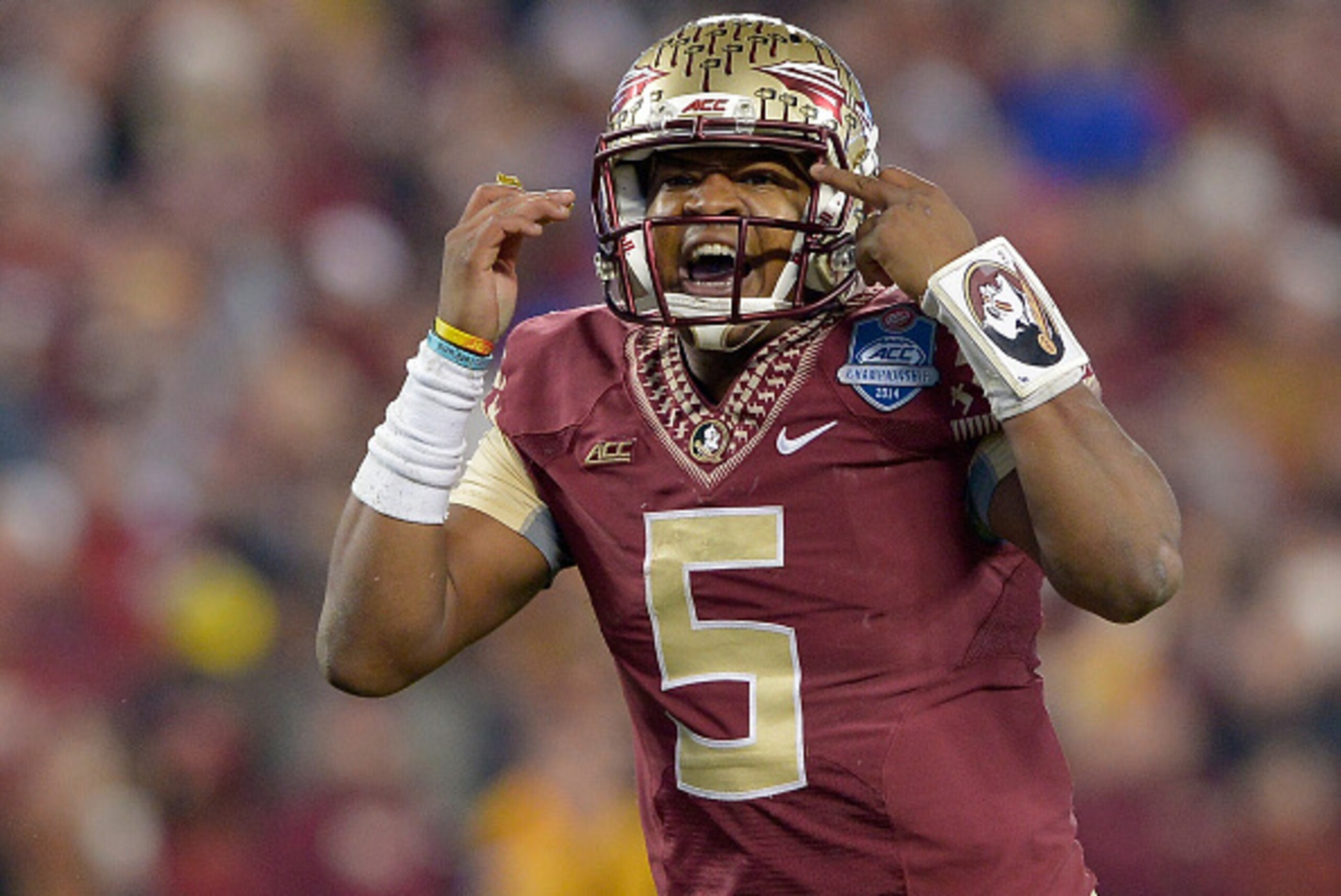 CHARLOTTE, NC - DECEMBER 06:  Jameis Winston #5 of the Florida State Seminoles calls an audible against the Georgia Tech Yellow Jackets during the Atlantic Coast Conference championship game on December 6, 2014 in Greenville, North Carolina. Florida State