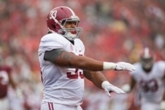 Oct 11, 2014; Fayetteville, AR, USA; Alabama Crimson Tide linebacker Trey DePriest (33) reacts to a call during a game against the Arkansas Razorbacks at Donald W. Reynolds Razorback Stadium. Alabama defeated Arkansas 14-13. Mandatory Credit: Beth Hall-US