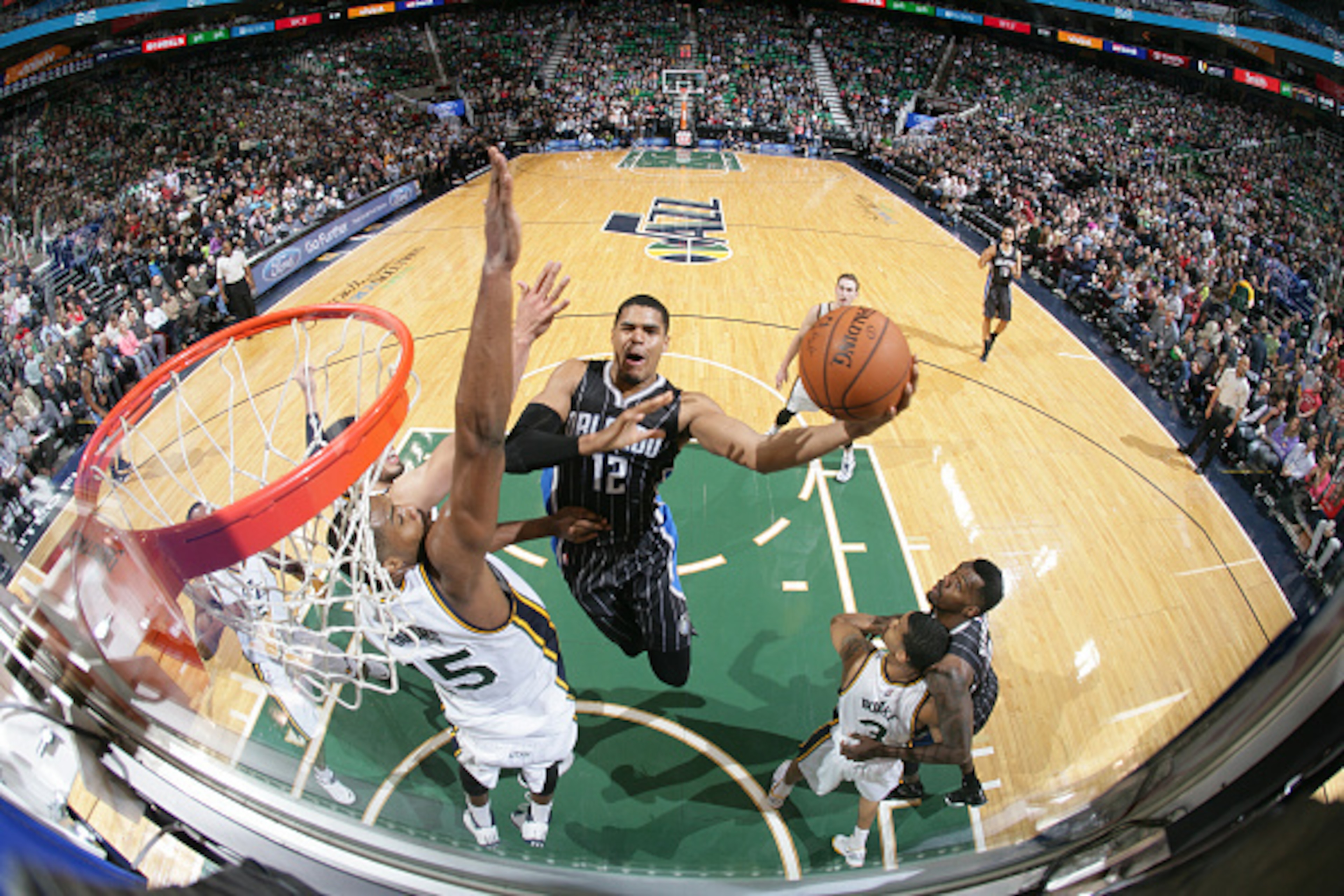 SALT LAKE CITY, UT - DECEMBER 5: Tobias Harris #12 of the Orlando Magic shoots the ball against the Utah Jazz during the game at EnergySolutions Arena on December 5, 2014 in Salt Lake City, Utah. NOTE TO USER: User expressly acknowledges and agrees that, SALT LAKE CITY, UT - DECEMBER 5: Tobias Harris #12 of the Orlando Magic shoots the ball against the Utah Jazz during the game at EnergySolutions Arena on December 5, 2014 in Salt Lake City, Utah. NOTE TO USER: User expressly acknowledges and agrees that,