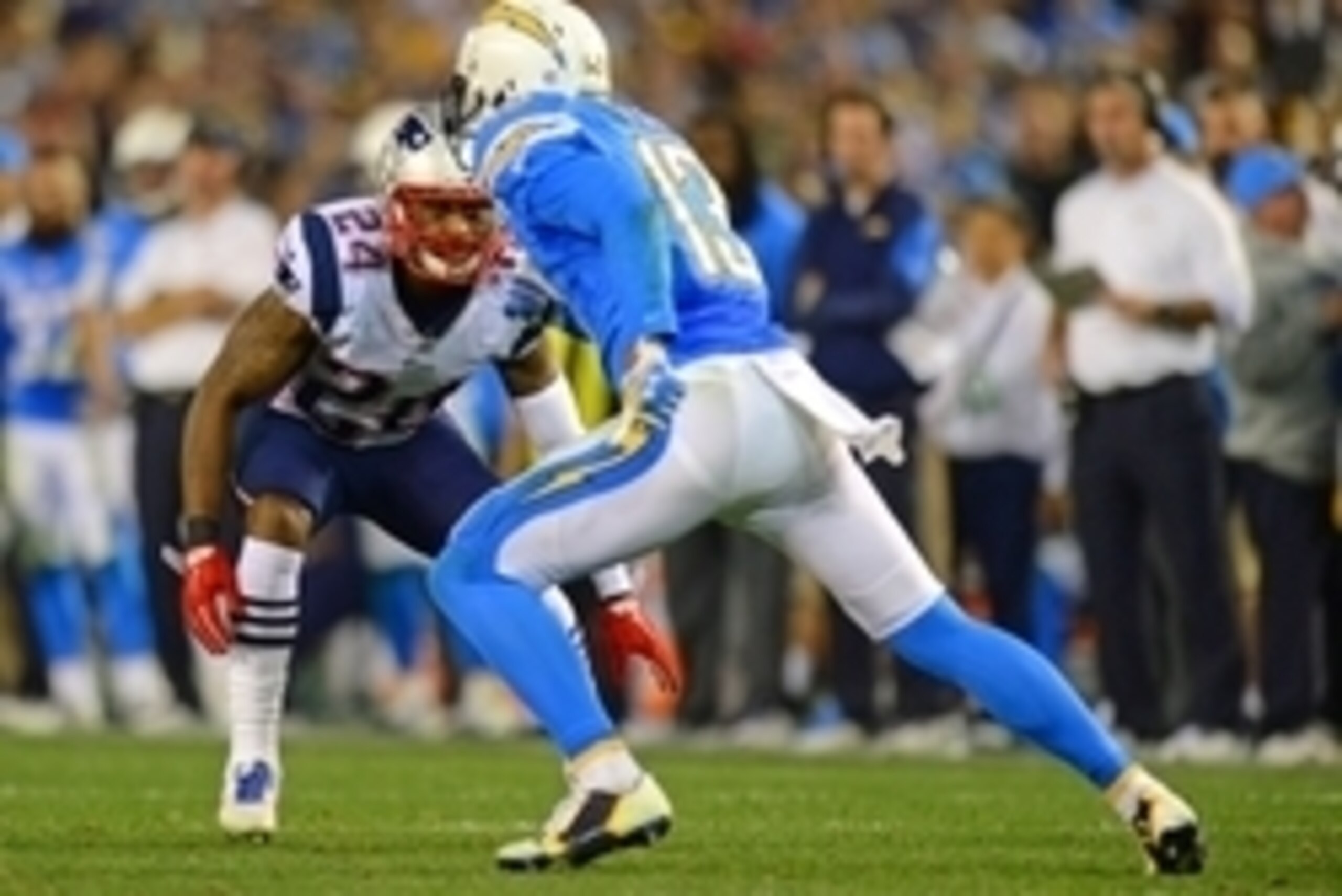 Dec 7, 2014; San Diego, CA, USA; New England Patriots cornerback Darrelle Revis (24) defends San Diego Chargers wide receiver Keenan Allen (13) during the fourth quarter at Qualcomm Stadium. Mandatory Credit: Jake Roth-USA TODAY Sports