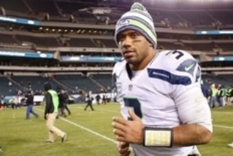 Dec 7, 2014; Philadelphia, PA, USA; Seattle Seahawks quarterback Russell Wilson (3) runs off the field at the conclusion of a game against the Philadelphia Eagles at Lincoln Financial Field. The Seahawks defeated the Eagles 24-14. Mandatory Credit: Bill S
