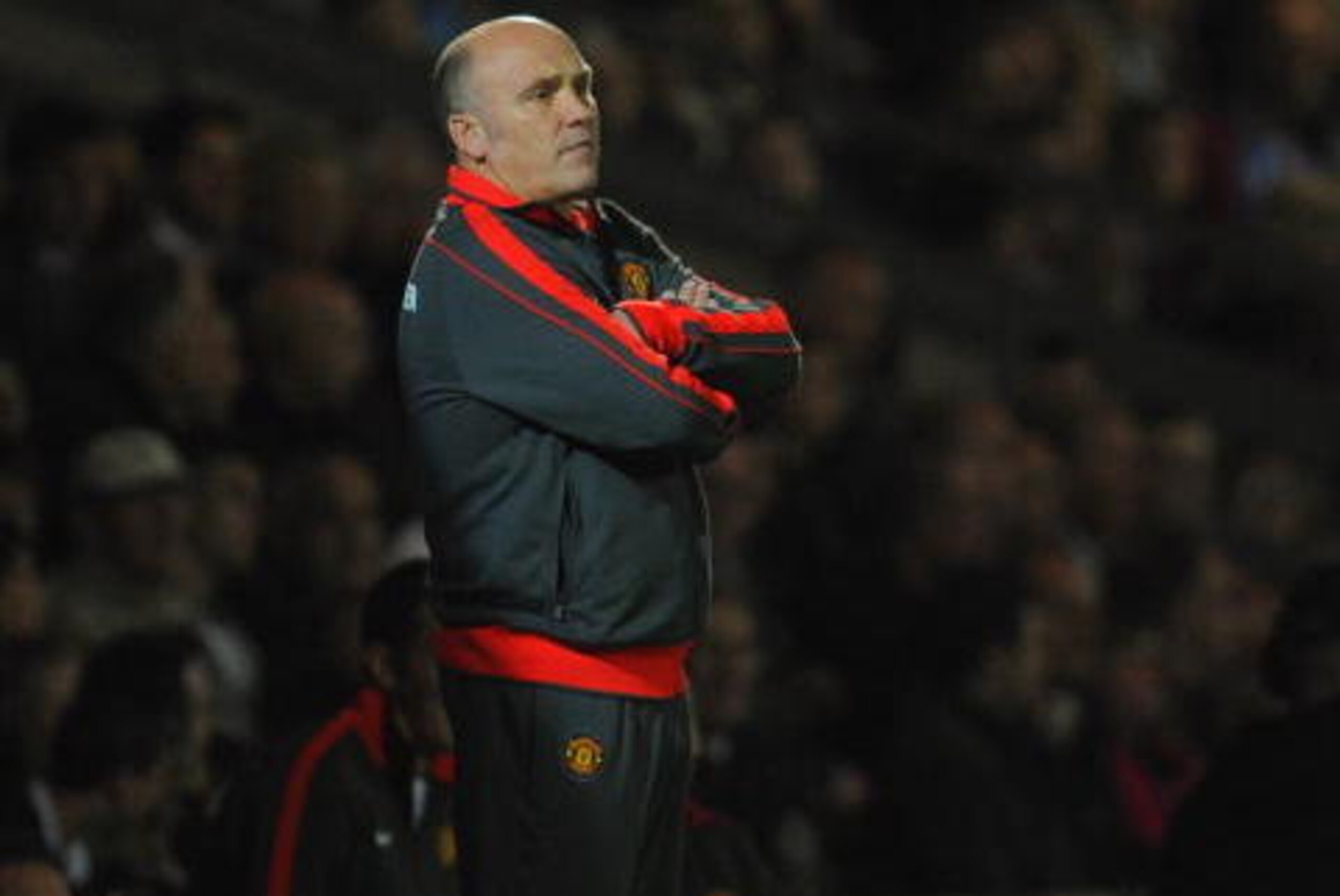 SCUNTHORPE, ENGLAND - SEPTEMBER 22: Manchester United assistant manager Mike Phelan looks on during the Carling Cup 3rd Round match between Scunthorpe United and Manchester United at Glanford Park on September 22, 2010 in Scunthorpe, England.  (Photo by M
