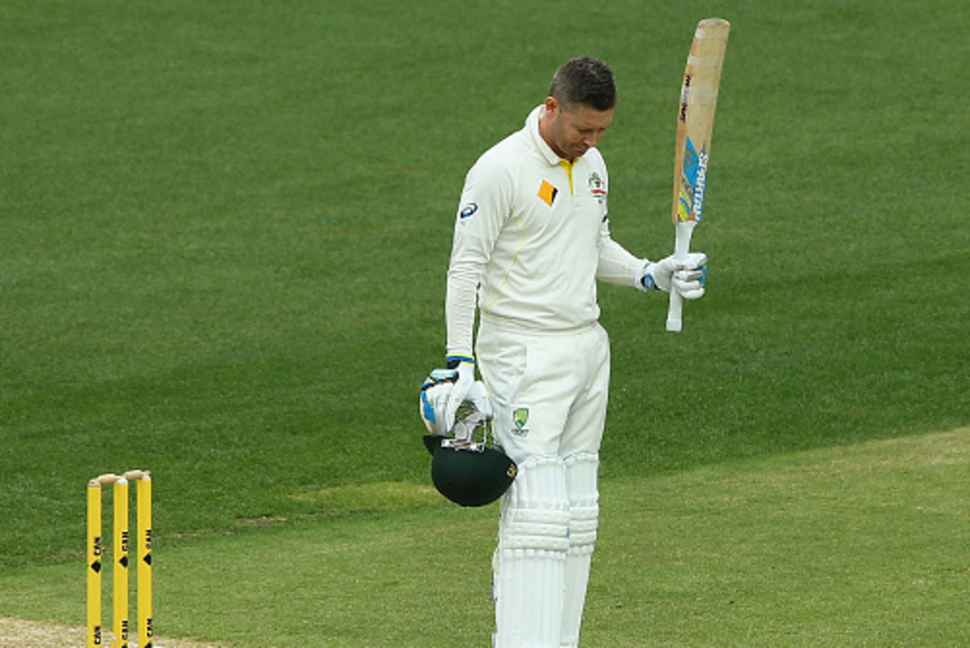 ADELAIDE, AUSTRALIA - DECEMBER 10:  Michael Clarke of Australia raises his bat after scoring his century during day two of the First Test match between Australia and India at Adelaide Oval on December 10, 2014 in Adelaide, Australia.  (Photo by Robert Cia