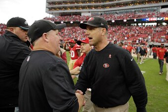 SANTA CLARA, CA - SEPTEMBER 28:  Head coach Jim Harbaugh of the San Francisco 49ers (right) shakes hands with head coach Chip Kelly of the Philadelphia Eagles after the 49ers beat the Eagles at Levi's Stadium on September 28, 2014 in Santa Clara, Californ