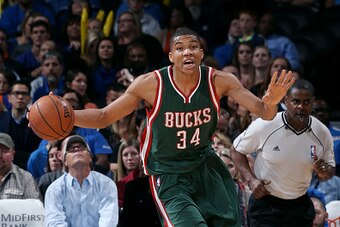 OKLAHOMA CITY, OK- DECEMBER 9: Giannis Antetokounmpo #34 of the Milwaukee Bucks drives against the Oklahoma City Thunder on December 9, 2014 at Chesapeake Energy Arena in Oklahoma City, OK. NOTE TO USER: User expressly acknowledges and agrees that, by dow
