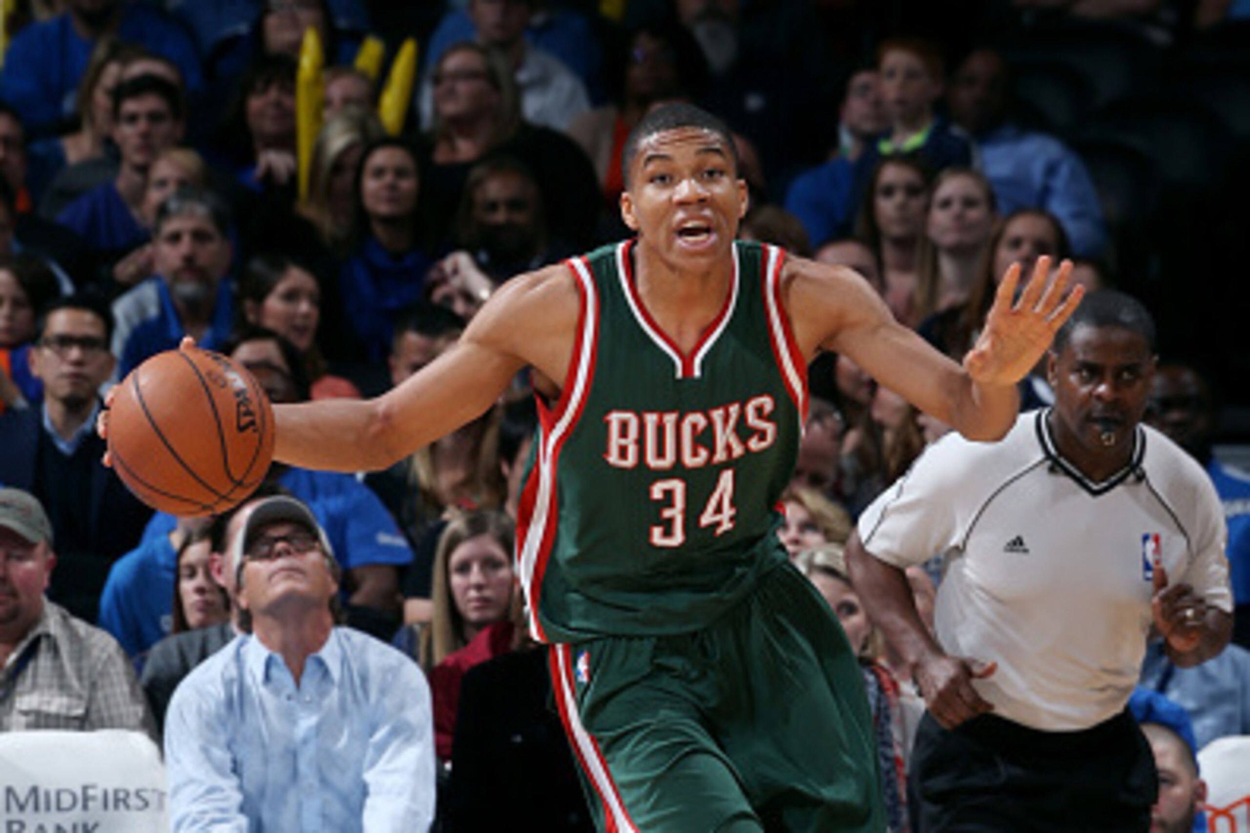 OKLAHOMA CITY, OK- DECEMBER 9: Giannis Antetokounmpo #34 of the Milwaukee Bucks drives against the Oklahoma City Thunder on December 9, 2014 at Chesapeake Energy Arena in Oklahoma City, OK. NOTE TO USER: User expressly acknowledges and agrees that, by dow