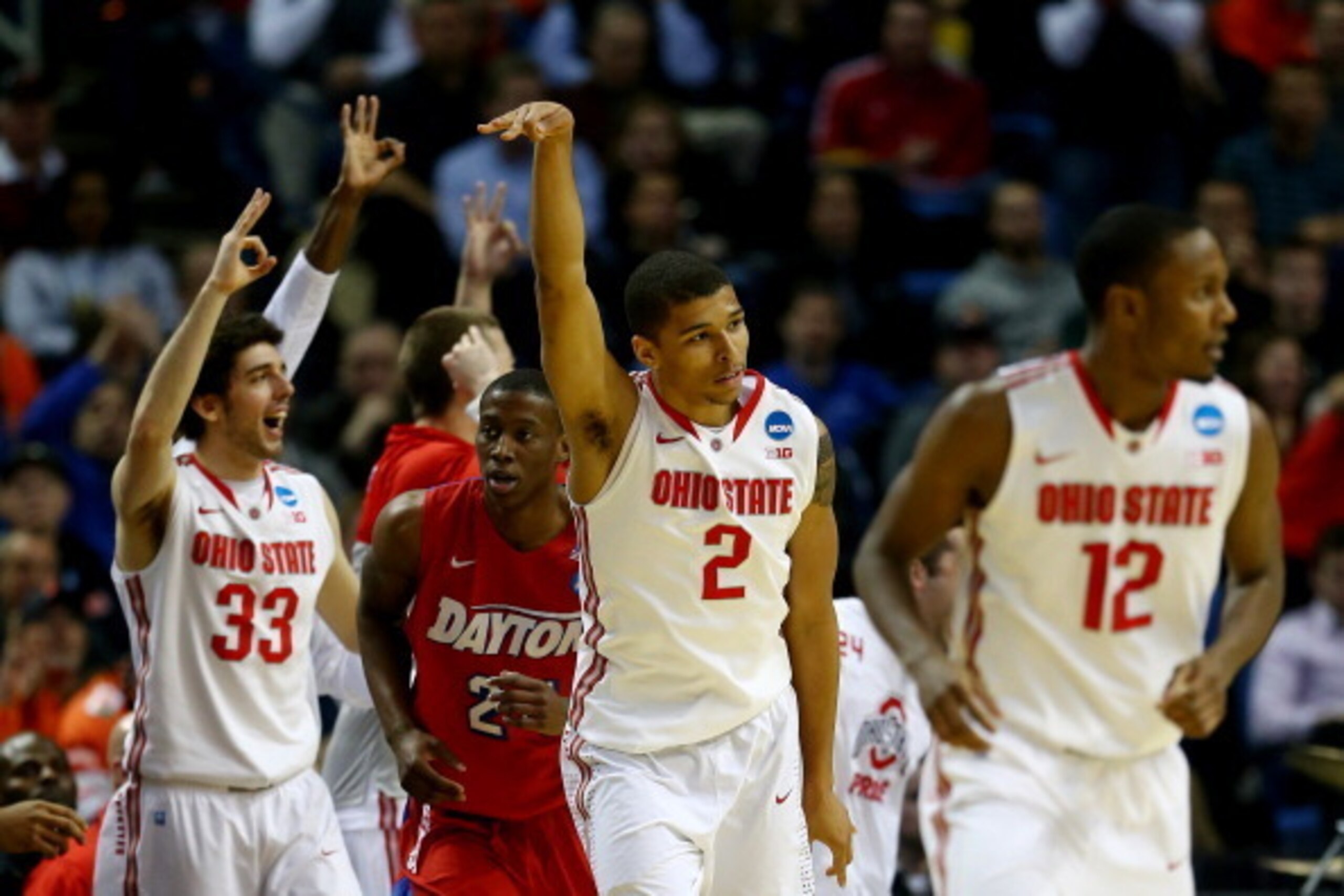 BUFFALO, NY - MARCH 20:  Marc Loving #2 of the Ohio State Buckeyes reacts after hitting a shot against the Dayton Flyers during the second round of the 2014 NCAA Men's Basketball Tournament at the First Niagara Center on March 20, 2014 in Buffalo, New Yor