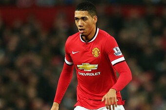 MANCHESTER, ENGLAND - NOVEMBER 29:  Chris Smalling of Manchester United in action during the Barclays Premier League match between Manchester United and Hull City at Old Trafford on November 29, 2014 in Manchester, England.  (Photo by Matthew Lewis/Getty 