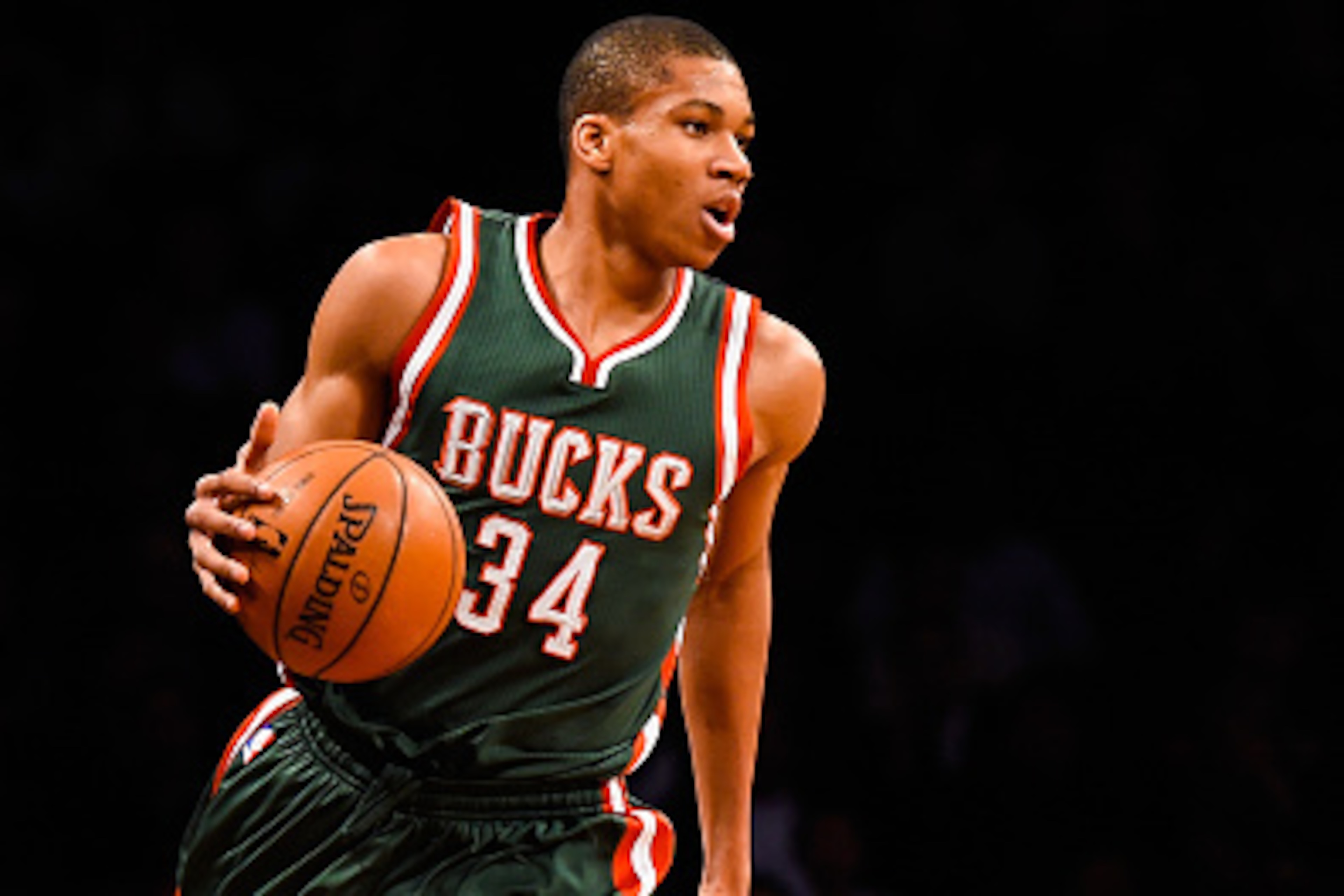 NEW YORK, NY - NOVEMBER 19: Giannis Antetokounmpo #34 of the Milwaukee Bucks in action during a game against the Brooklyn Nets at the Barclays Center on November 19, 2014 in the Brooklyn borough of New York City. NOTE TO USER: User expressly acknowledges 