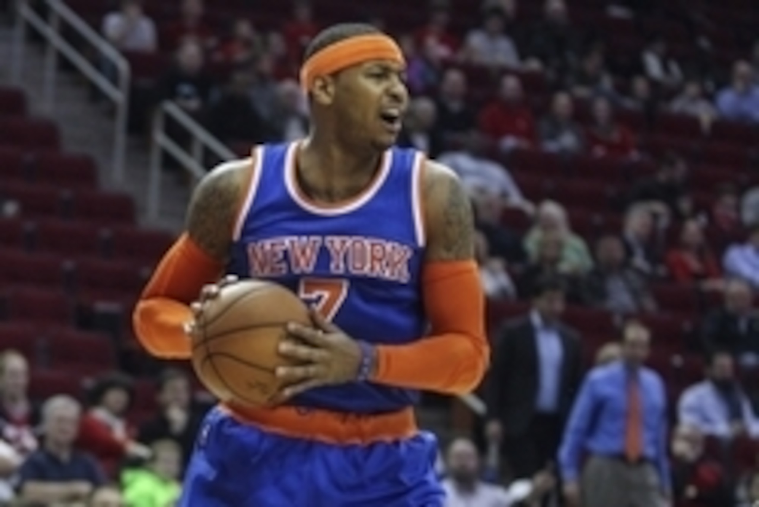 Nov 24, 2014; Houston, TX, USA; New York Knicks forward Carmelo Anthony (7) gets a rebound during the first half against the Houston Rockets at Toyota Center. The Rockets defeated the Knicks 91-86. Mandatory Credit: Troy Taormina-USA TODAY Sports