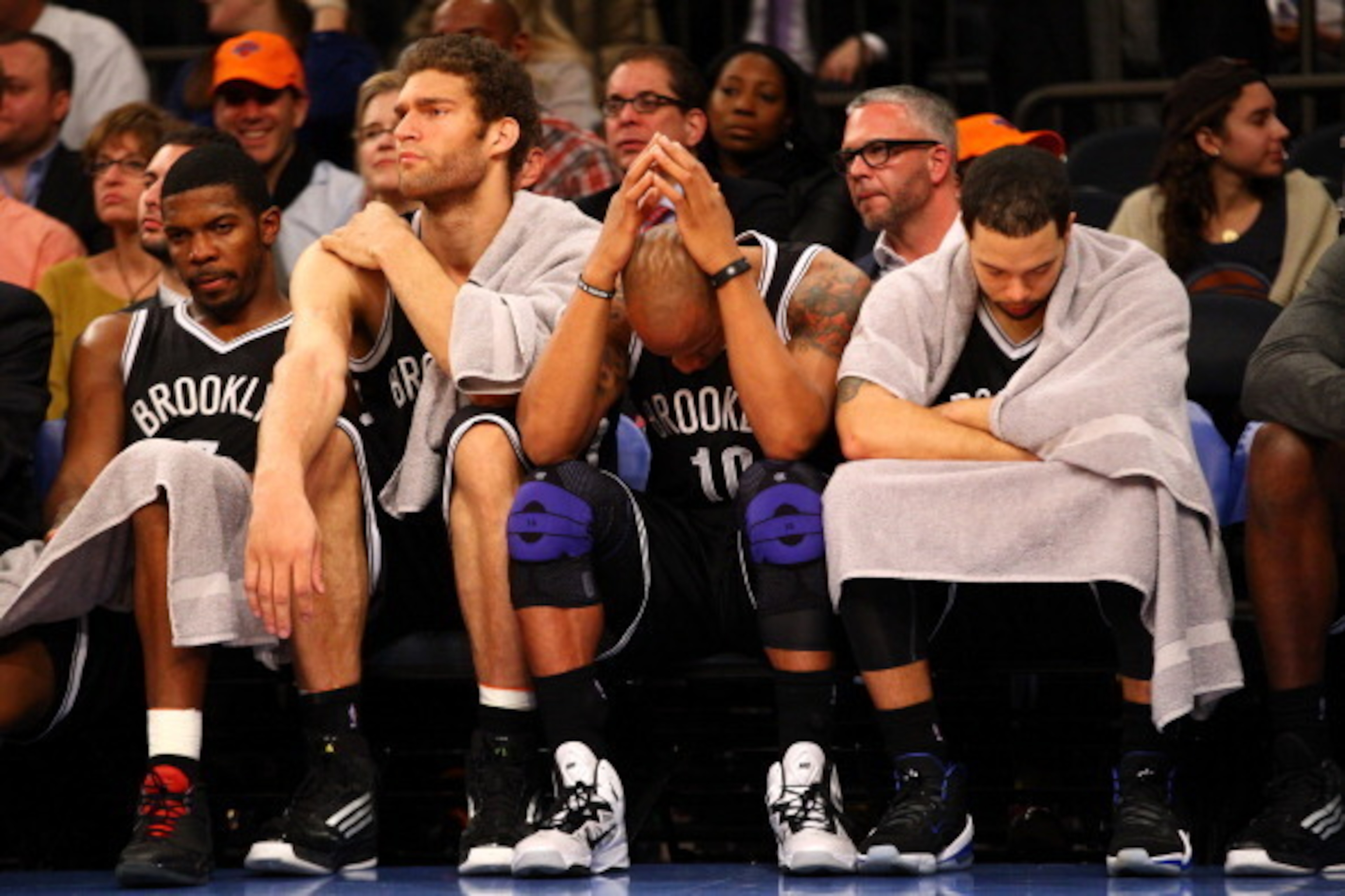 NEW YORK, NY - DECEMBER 19: Joe Johnson #7,Brook Lopez, Keith Bogans, and Deron Williams #8 of the Brooklyn Nets look on during the 100-86 loss to the New York Knicks during their game at Madison Square Garden on December 19, 2012 in New York City. NOTE NEW YORK, NY - DECEMBER 19: Joe Johnson #7,Brook Lopez, Keith Bogans, and Deron Williams #8 of the Brooklyn Nets look on during the 100-86 loss to the New York Knicks during their game at Madison Square Garden on December 19, 2012 in New York City. NOTE