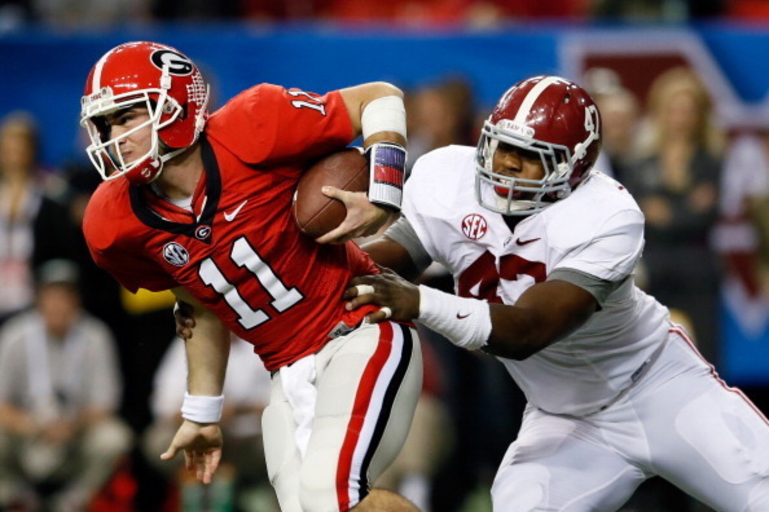 ATLANTA, GA - DECEMBER 01:  Linebacker Xzavier Dickson #47 of the Alabama Crimson Tide tackles quarterback Aaron Murray #11 of the Georgia Bulldogs during the second quarter of the SEC Championship Game at the Georgia Dome on December 1, 2012 in Atlanta, 