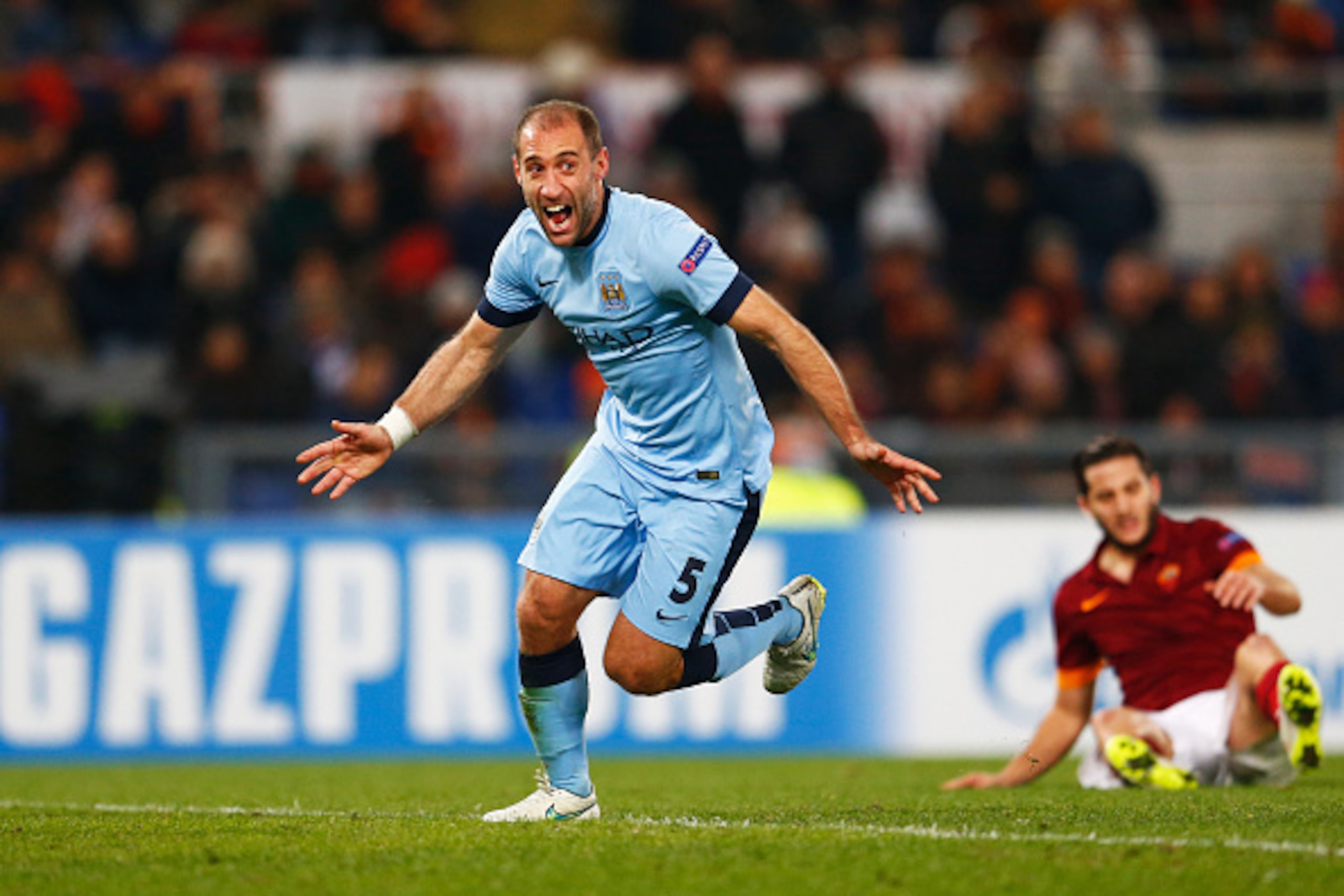 ROME, ITALY - DECEMBER 10: Pablo Zabaleta of Manchester City celebrates as he scores their second goal during the UEFA Champions League Group E match between AS Roma and Manchester City FC at Stadio Olimpico on December 10, 2014 in Rome, Italy. (Photo b ROME, ITALY - DECEMBER 10: Pablo Zabaleta of Manchester City celebrates as he scores their second goal during the UEFA Champions League Group E match between AS Roma and Manchester City FC at Stadio Olimpico on December 10, 2014 in Rome, Italy. (Photo b
