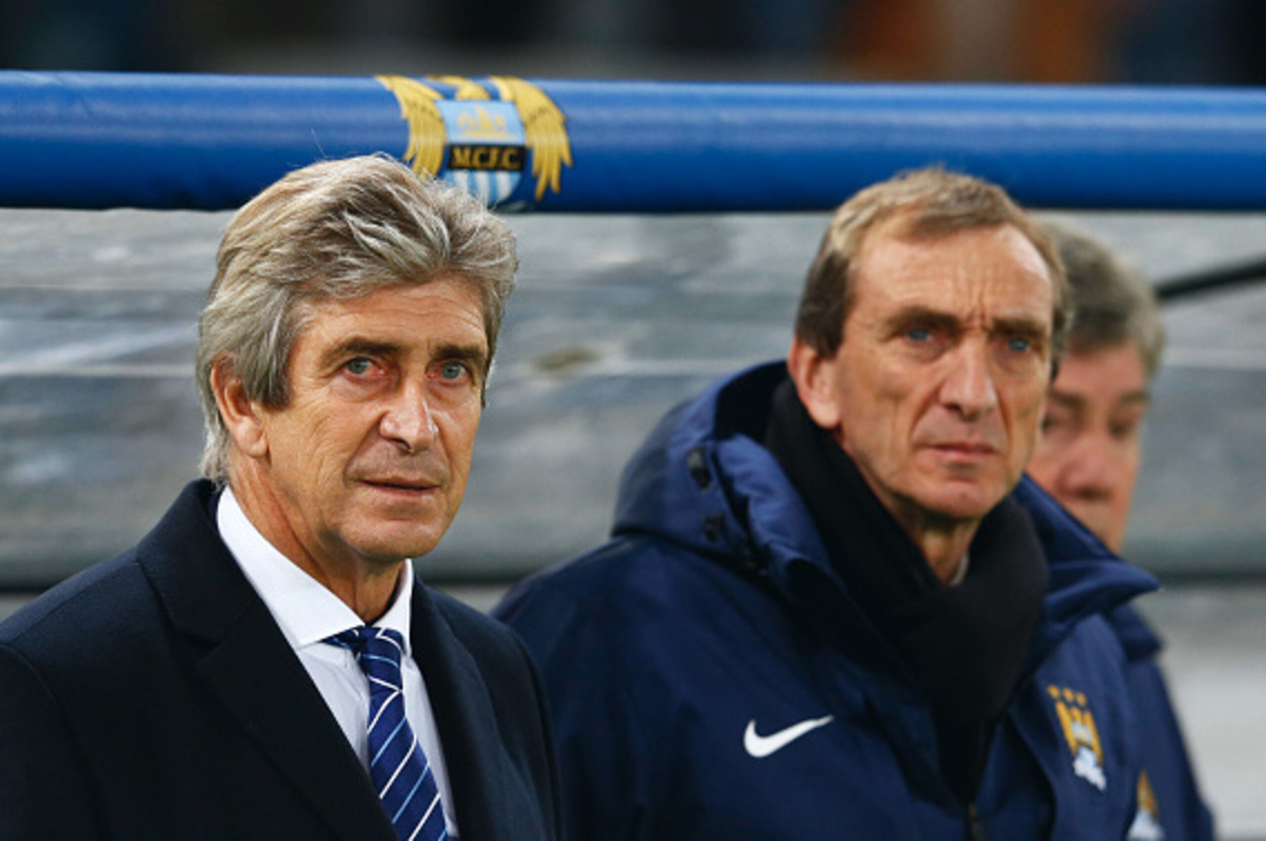ROME, ITALY - DECEMBER 10: Manuel Pellegrini manager of Manchester City (L) and assistant Ruben Cousillas look on prior to the UEFA Champions League Group E match between AS Roma and Manchester City FC at Stadio Olimpico on December 10, 2014 in Rome, Ita ROME, ITALY - DECEMBER 10: Manuel Pellegrini manager of Manchester City (L) and assistant Ruben Cousillas look on prior to the UEFA Champions League Group E match between AS Roma and Manchester City FC at Stadio Olimpico on December 10, 2014 in Rome, Ita