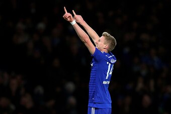 LONDON, ENGLAND - DECEMBER 10:  Andre Schuerrle of Chelsea celebrates after scoring his team's second goal during the UEFA Champions League group G match between Chelsea and Sporting Clube de Portugal at Stamford Bridge on December 10, 2014 in London, Uni
