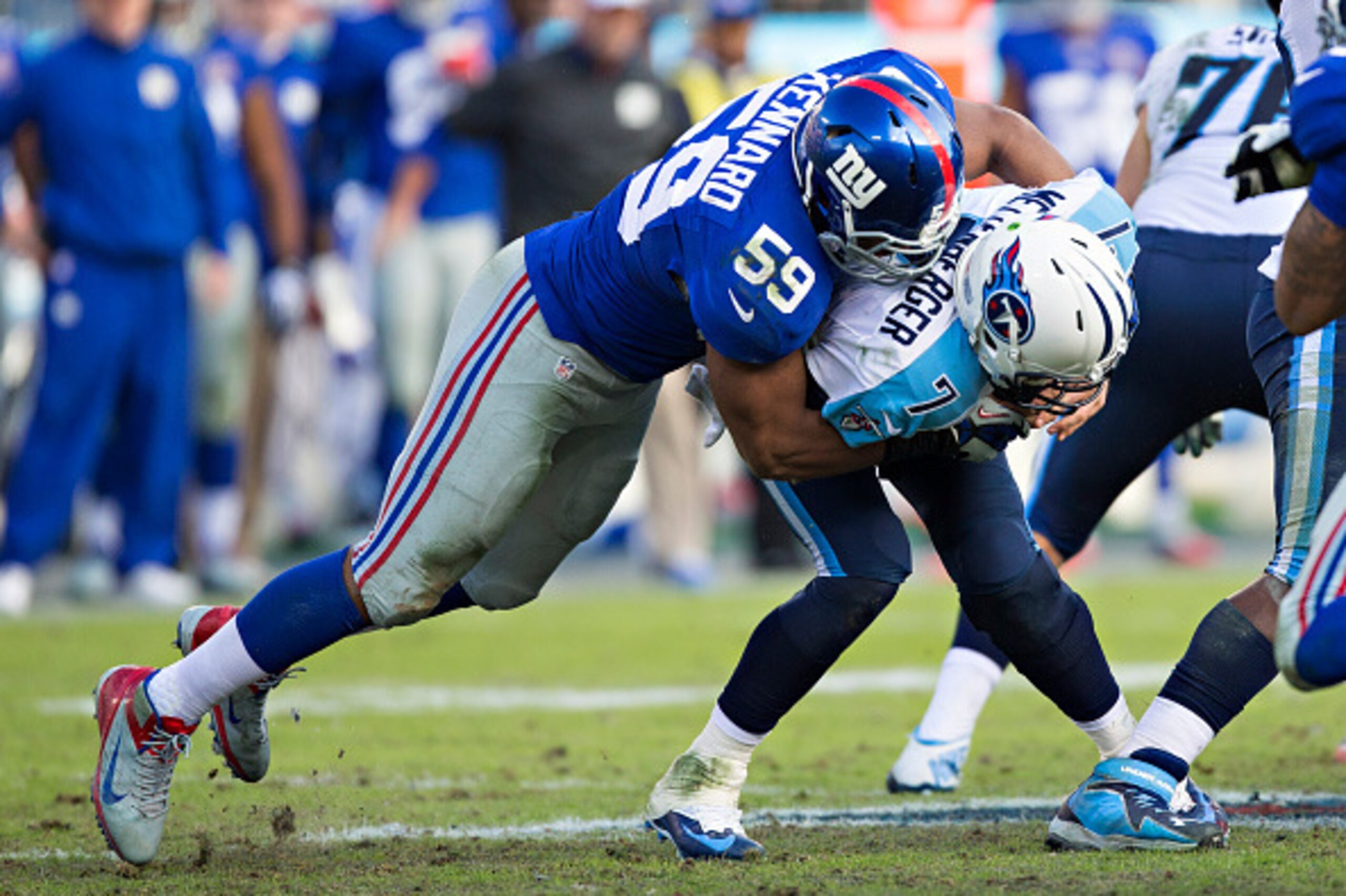 NASHVILLE, TN - DECEMBER 7:  Devon Kennard #59 of the New York Giants sacks Zach Mettenberger #7 of the Tennessee Titans in the fourth quarter at LP Field on December 7, 2014 in Nashville, Tennessee.  The Giants defeated the Titans 36-7.  (Photo by Wesley