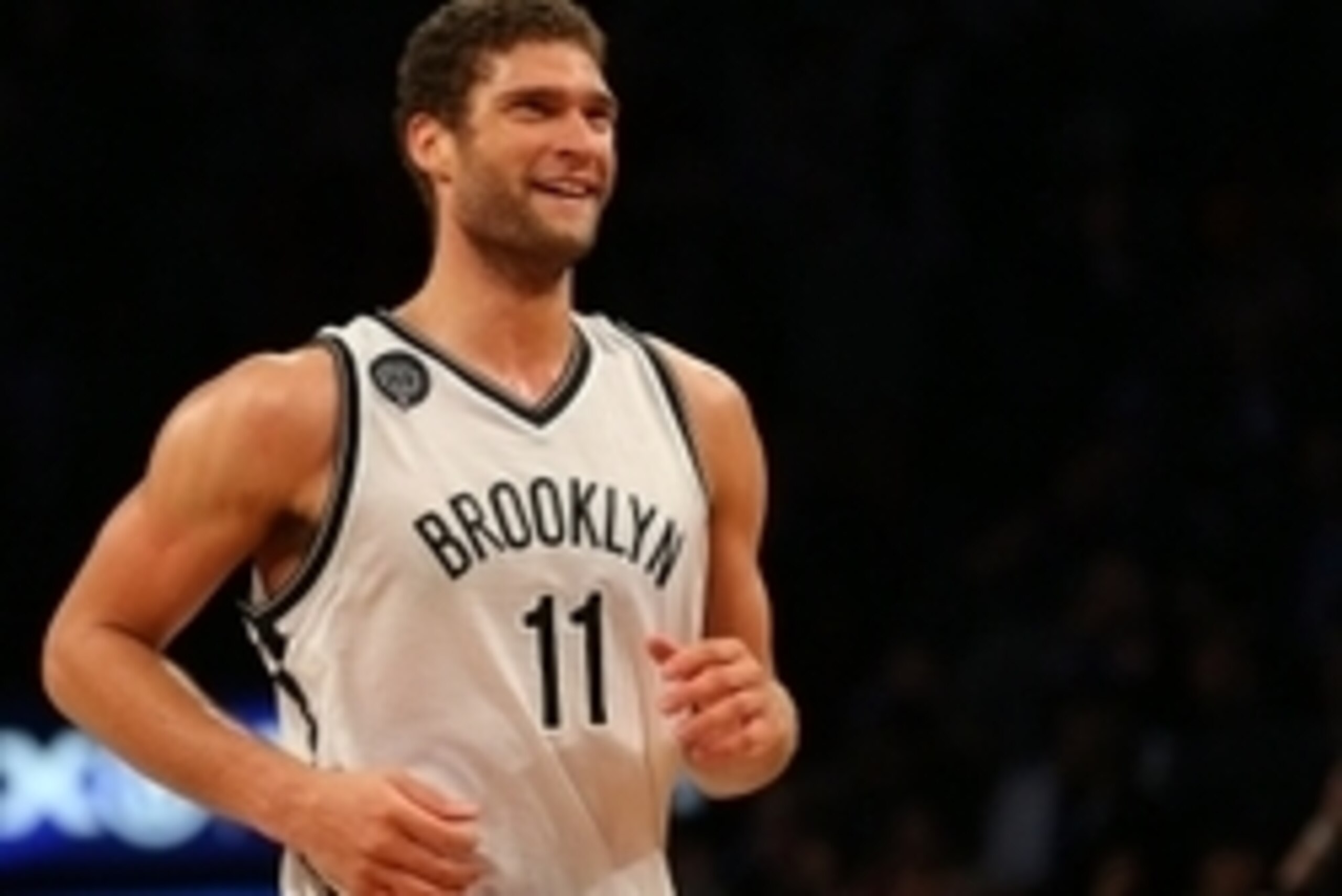 Dec 3, 2014; Brooklyn, NY, USA; Brooklyn Nets center Brook Lopez (11) reacts after making a shot late in the fourth quarter against the San Antonio Spurs at the Barclays Center. The Nets defeated the Spurs 95-93. Mandatory Credit: Adam Hunger-USA TODAY Sp