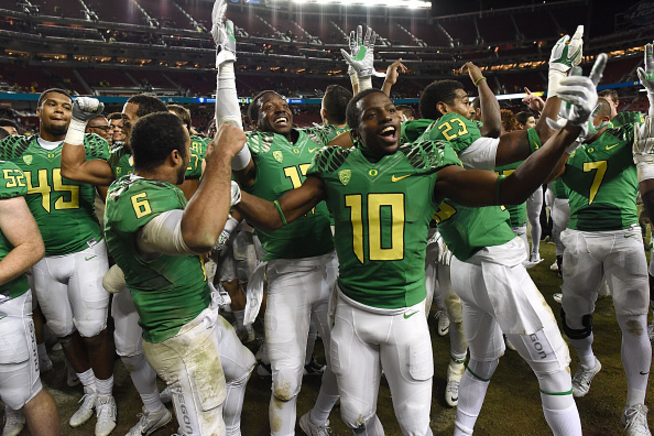 SANTA CLARA, CA - DECEMBER 05:  Johnathan Loyd #10 of the Oregon Ducks celebrates their PAC-12 Championship victory against the Arizona Wildcats at Levi's Stadium on December 5, 2014 in Santa Clara, California.  (Photo by Thearon W. Henderson/Getty Images