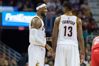 CLEVELAND, OH - NOVEMBER 15: LeBron James #23 talks with Tristan Thompson #13 of the Cleveland Cavaliers during the second half against the Atlanta Hawks at Quicken Loans Arena on November 15, 2014 in Cleveland, Ohio. The Cavaliers defeated the Hawks 127-