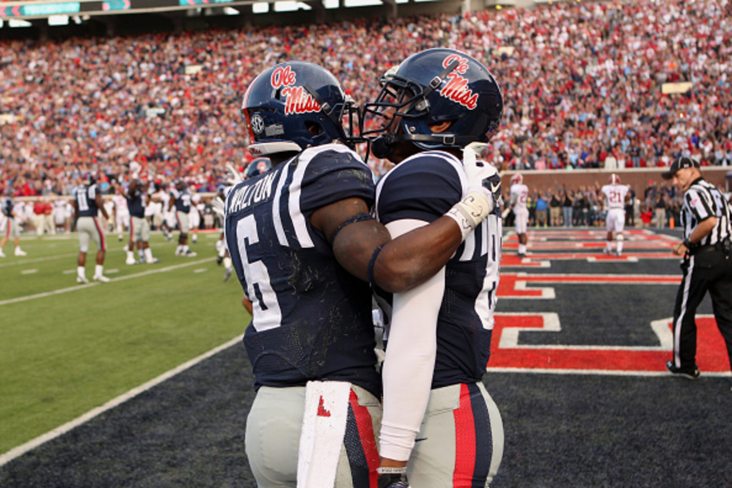 OXFORD, MS - OCTOBER 4: Jaylen Walton #6 of the Ole Miss Rebels celebrates his touchdown with John Ratliff #88 against the Alabama Crimson Tide on OCTOBER 4, 2014 at Vaught-Hemingway Stadium in Oxford, Mississippi. Mississippi beat Alabama 23-17. (Photo b