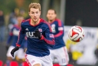 Nov 1, 2014; Columbus, OH, USA; New England Revolution forward Patrick Mullins (7) chases down a ball in the second half of the game against the Columbus Crew at Crew Stadium. New England Revolution beat the Columbus Crew by the score of 4-2. Mandatory Cr