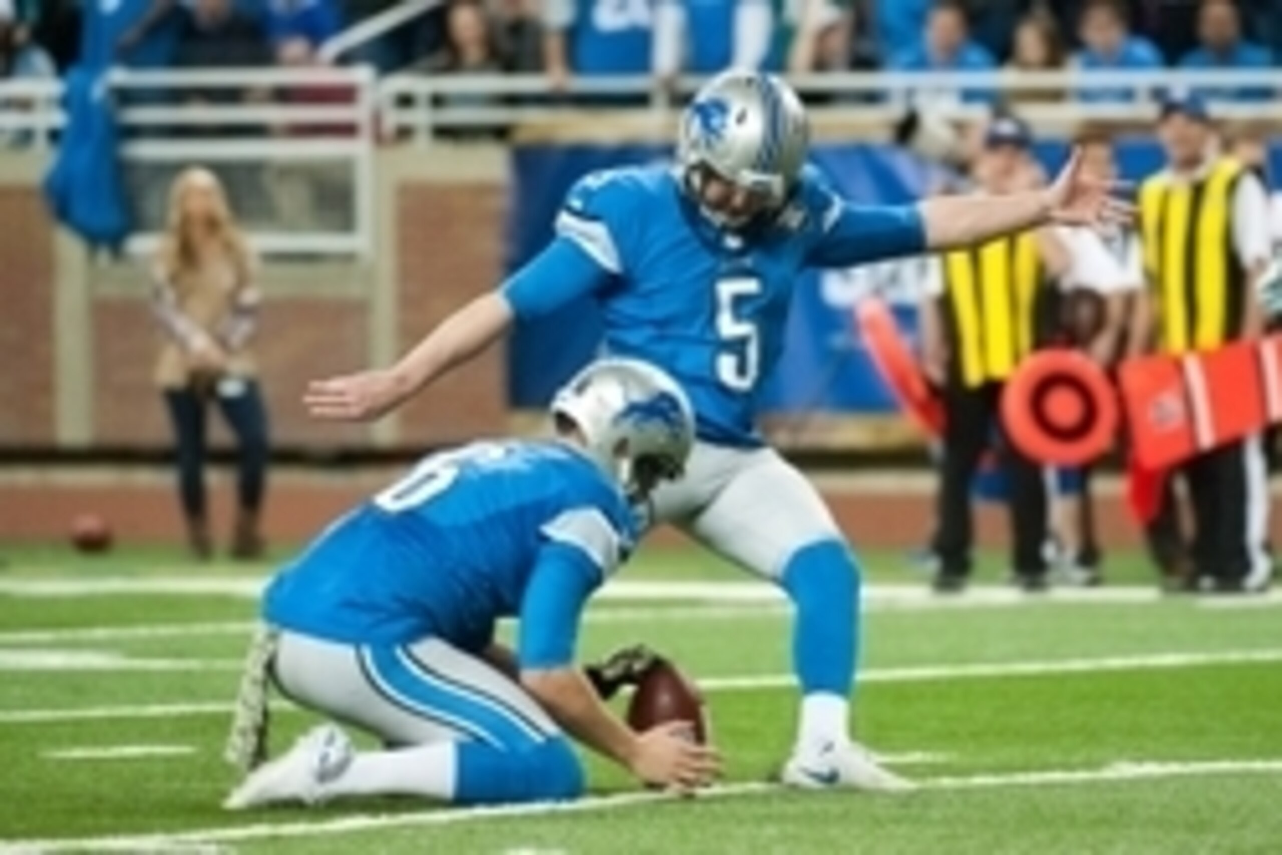 Nov 9, 2014; Detroit, MI, USA; Detroit Lions punter Sam Martin (6) holds the ball as kicker Matt Prater (5) kicks a field goal during the fourth quarter against the Miami Dolphins at Ford Field. Detroit won 20-16. Mandatory Credit: Tim Fuller-USA TODAY Sp Nov 9, 2014; Detroit, MI, USA; Detroit Lions punter Sam Martin (6) holds the ball as kicker Matt Prater (5) kicks a field goal during the fourth quarter against the Miami Dolphins at Ford Field. Detroit won 20-16. Mandatory Credit: Tim Fuller-USA TODAY Sp