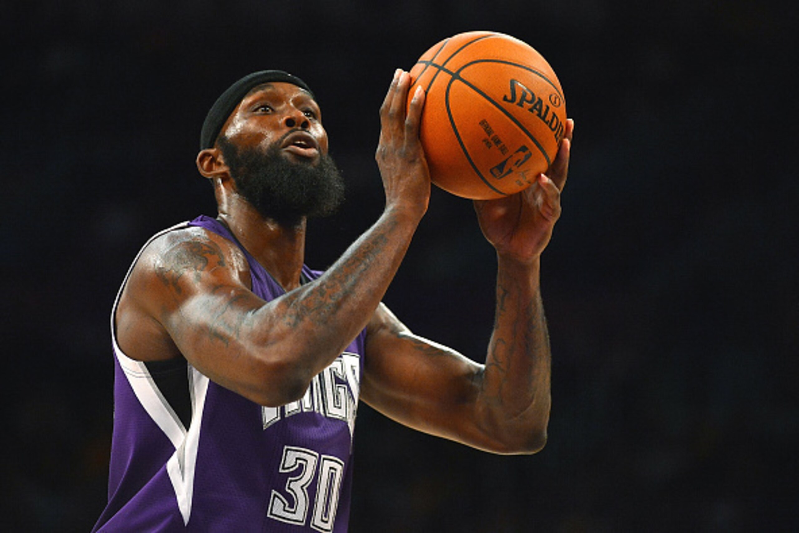 LOS ANGELES, CA - DECEMBER 09:  Reggie Evans #30 of the Sacramento Kings shoots a free throw during a game against the Los Angeles Lakers at Staples Center on December 9, 2014 in Los Angeles, California.   NOTE TO USER: User expressly acknowledges and agr