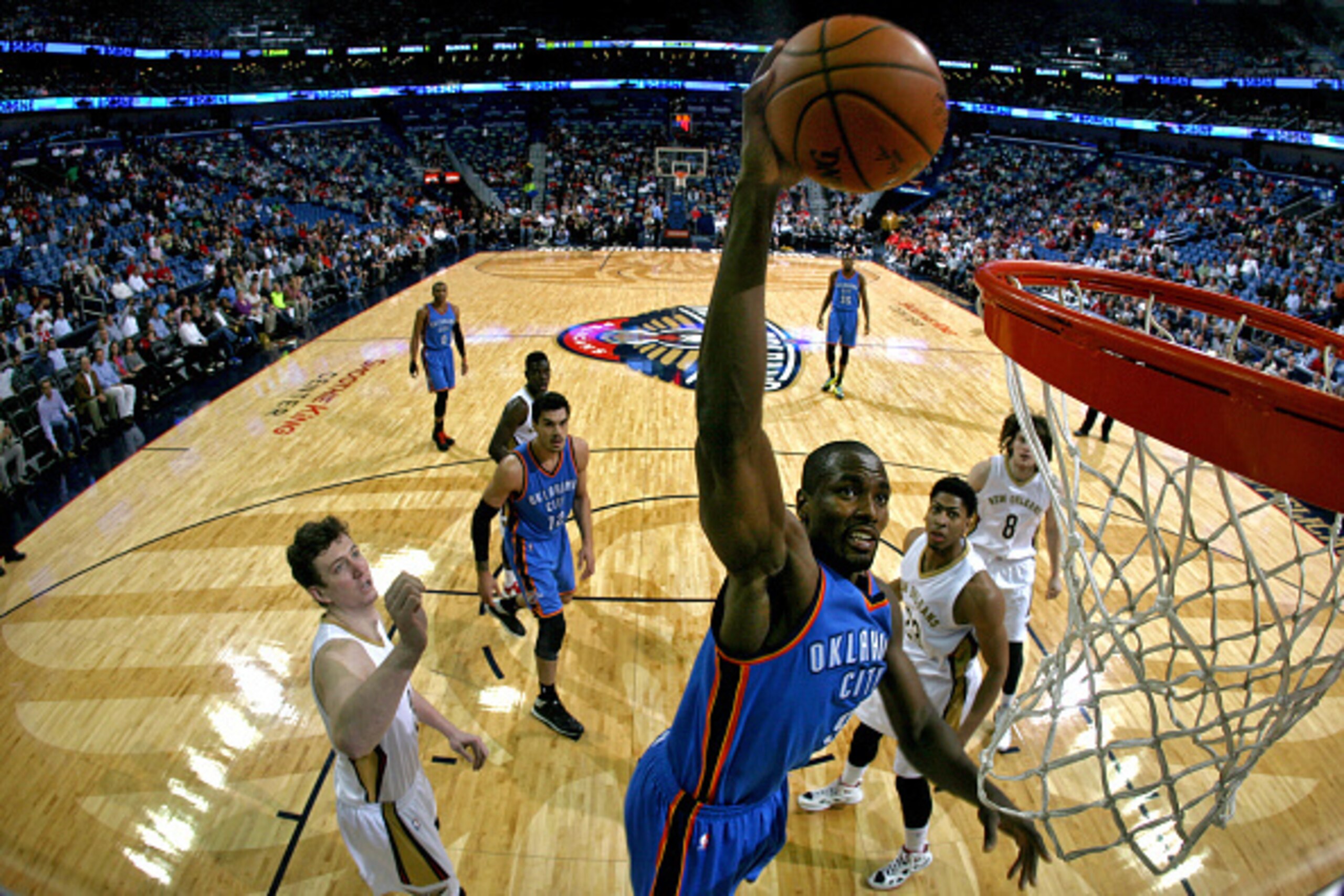 NEW ORLEANS, LA - DECEMBER 2:  Serge Ibaka #9 of the Oklahoma City Thunder drives to the basket against the New Orleans Pelicans during an NBA game on December 2, 2014 at the Smoothie King Center in New Orleans, Louisiana. NOTE TO USER: User expressly ack