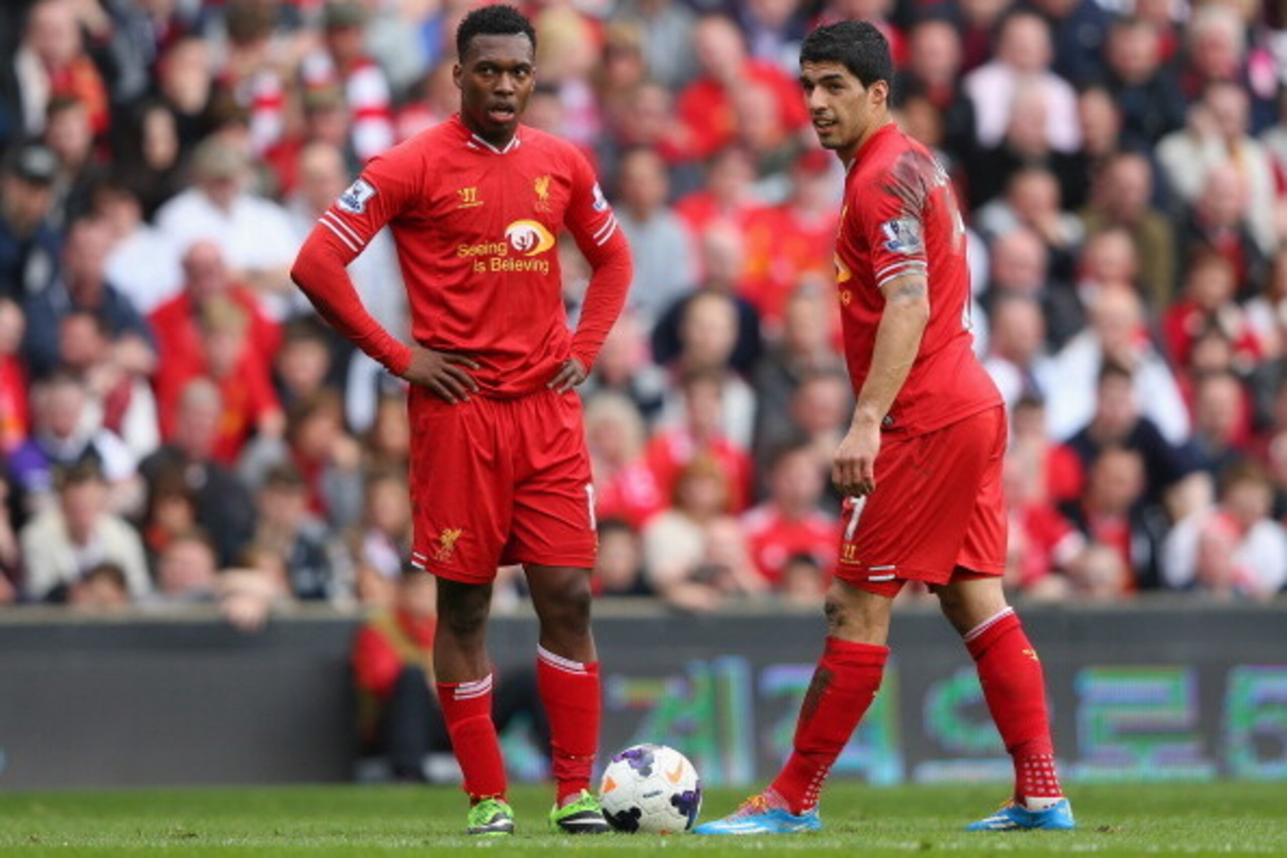 LIVERPOOL, ENGLAND - MARCH 30:  Luis Suarez (R) and Daniel Sturridge of Liverpool prepare to kick off during the Barclays Premier League match between Liverpool and Tottenham Hotspur at Anfield on March 30, 2014 in Liverpool, England.  (Photo by Alex Live