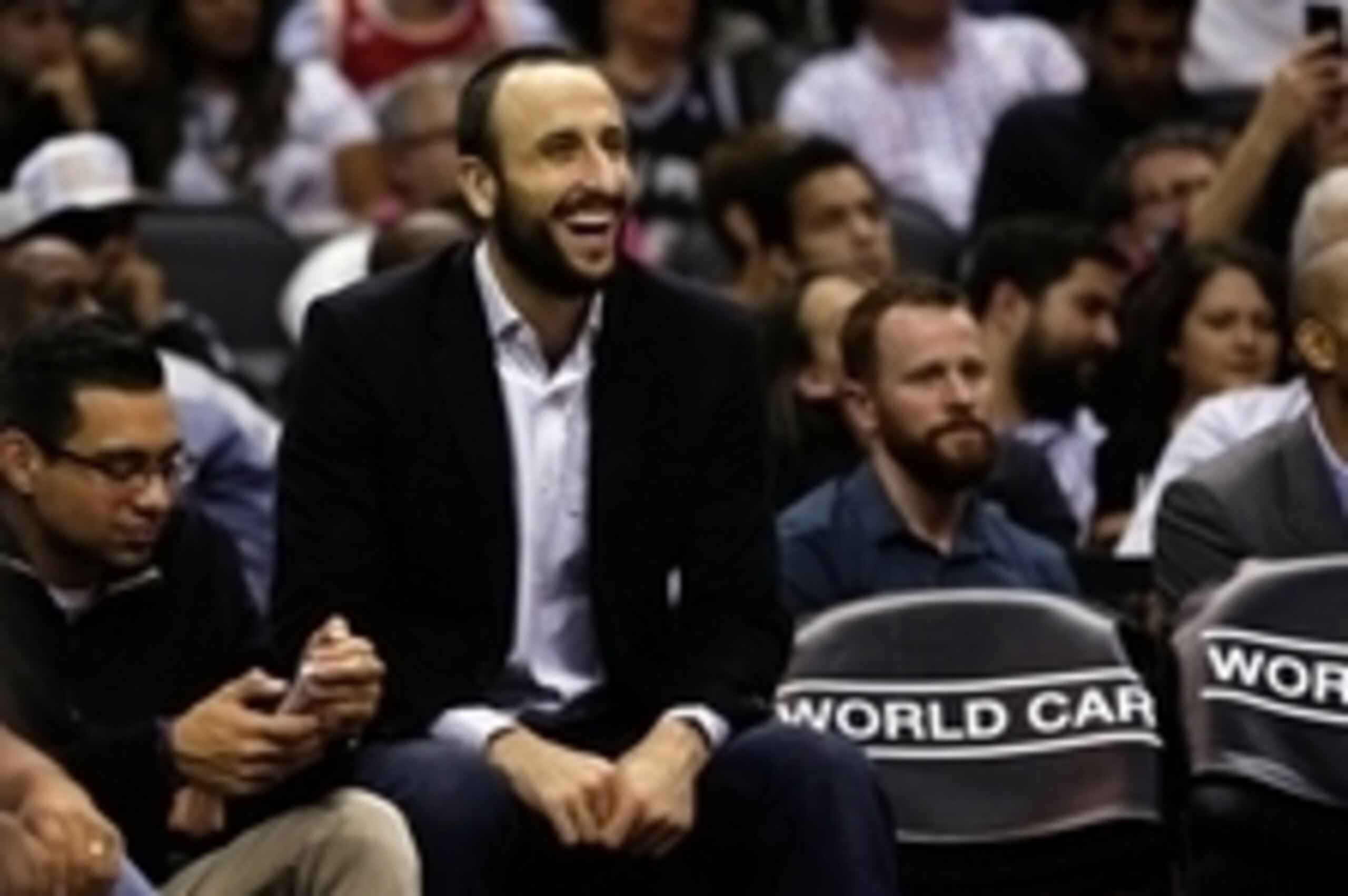 Dec 6, 2014; San Antonio, TX, USA; San Antonio Spurs shooting guard Manu Ginobili (20) smiles from the bench against the Minnesota Timberwolves during the second half at AT&T Center. Mandatory Credit: Soobum Im-USA TODAY Sports