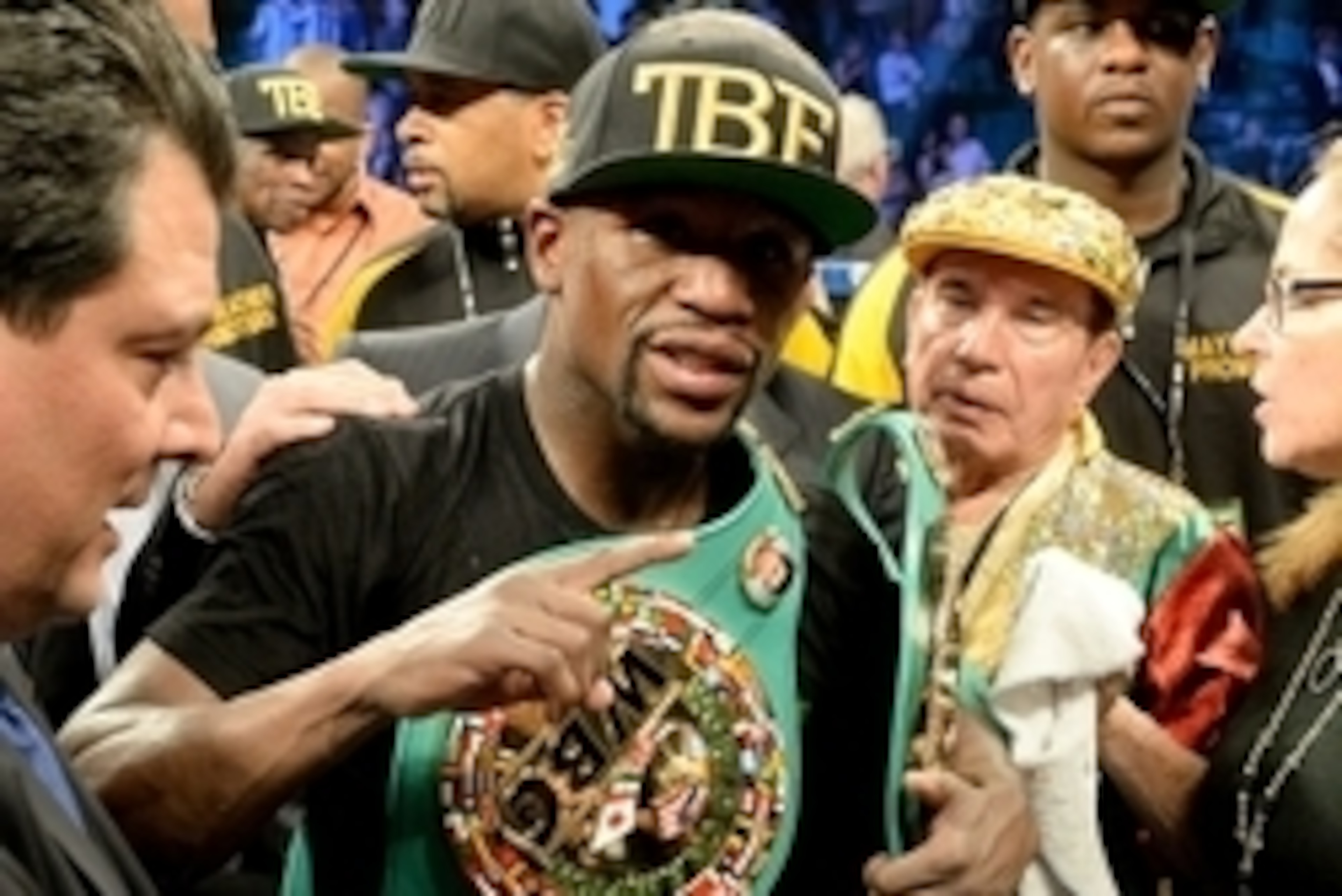 Sep 13, 2014; Las Vegas, NV, USA; Floyd Mayweather celebrates in the ring after defeating Marcos Maidana (not pictured) in their WBC & WBA Welterweight and WBC Superwelter Weight title fight at the MGM Grand Garden Arena. Mandatory Credit: Jayne Kamin-Onc