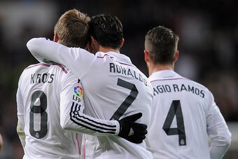 MADRID, SPAIN - DECEMBER 06:  Cristiano Ronaldo of Real Madrid celebrates with Toni Kroos after scoring Real's 2nd goal during the La Liga match between Real Madrid CF and Celta Vigo at Estadio Santiago Bernabeu on December 6, 2014 in Madrid, Spain.  (Pho