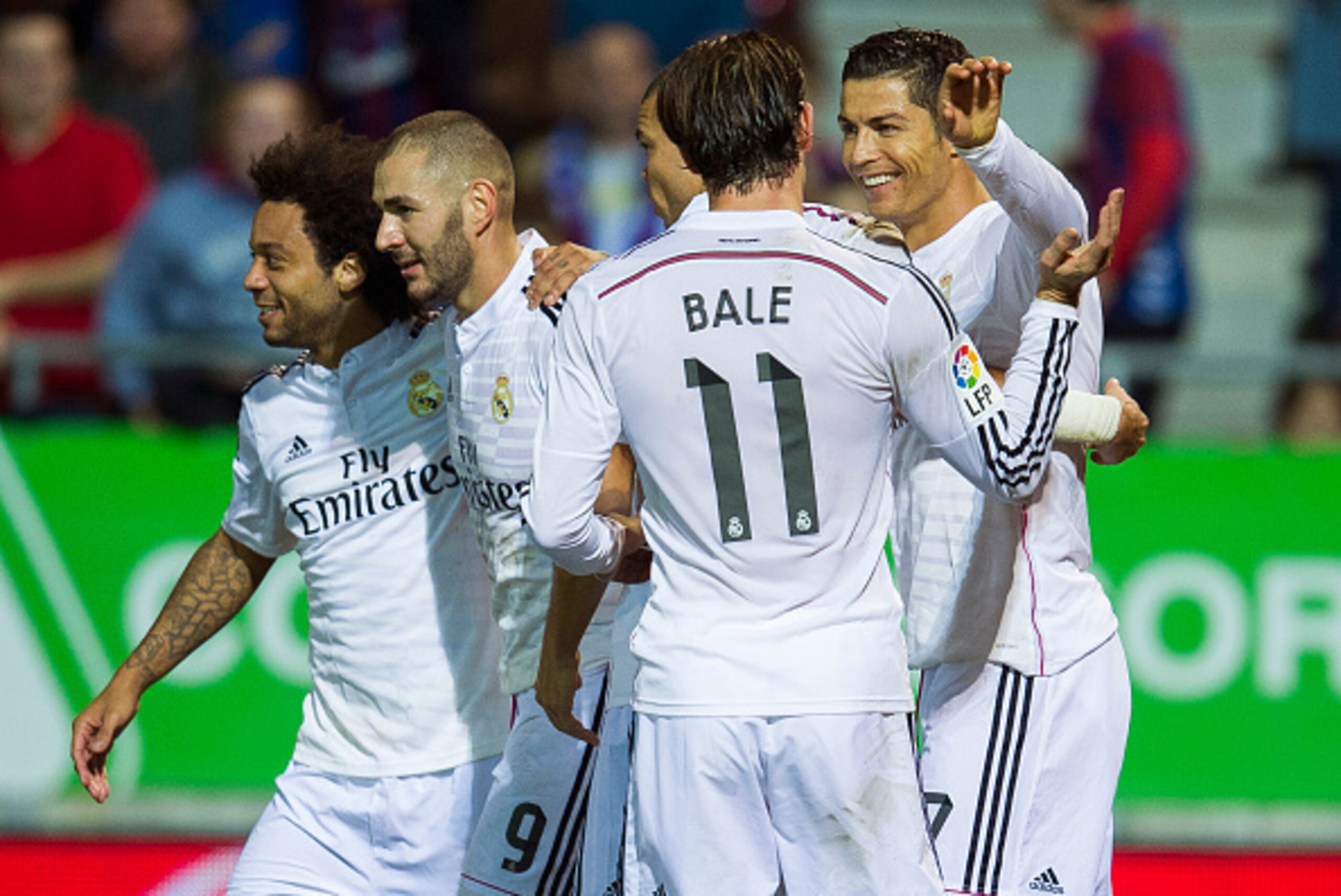 EIBAR, SPAIN - NOVEMBER 22:  Cristiano Ronaldo (R) of Real Madrid celebrates after scoring during the La Liga match between SD Eibar and Real Madrid at Ipurua Municipal Stadium on November 22, 2014 in Eibar, Spain.  (Photo by Juan Manuel Serrano Arce/Gett
