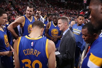PORTLAND, OR - NOVEMBER 2:  Steve Kerr of the Golden State Warriors talks with his team during the game against the Portland Trail Blazers on November 2, 2014 at the Moda Center Arena in Portland, Oregon. NOTE TO USER: User expressly acknowledges and agre