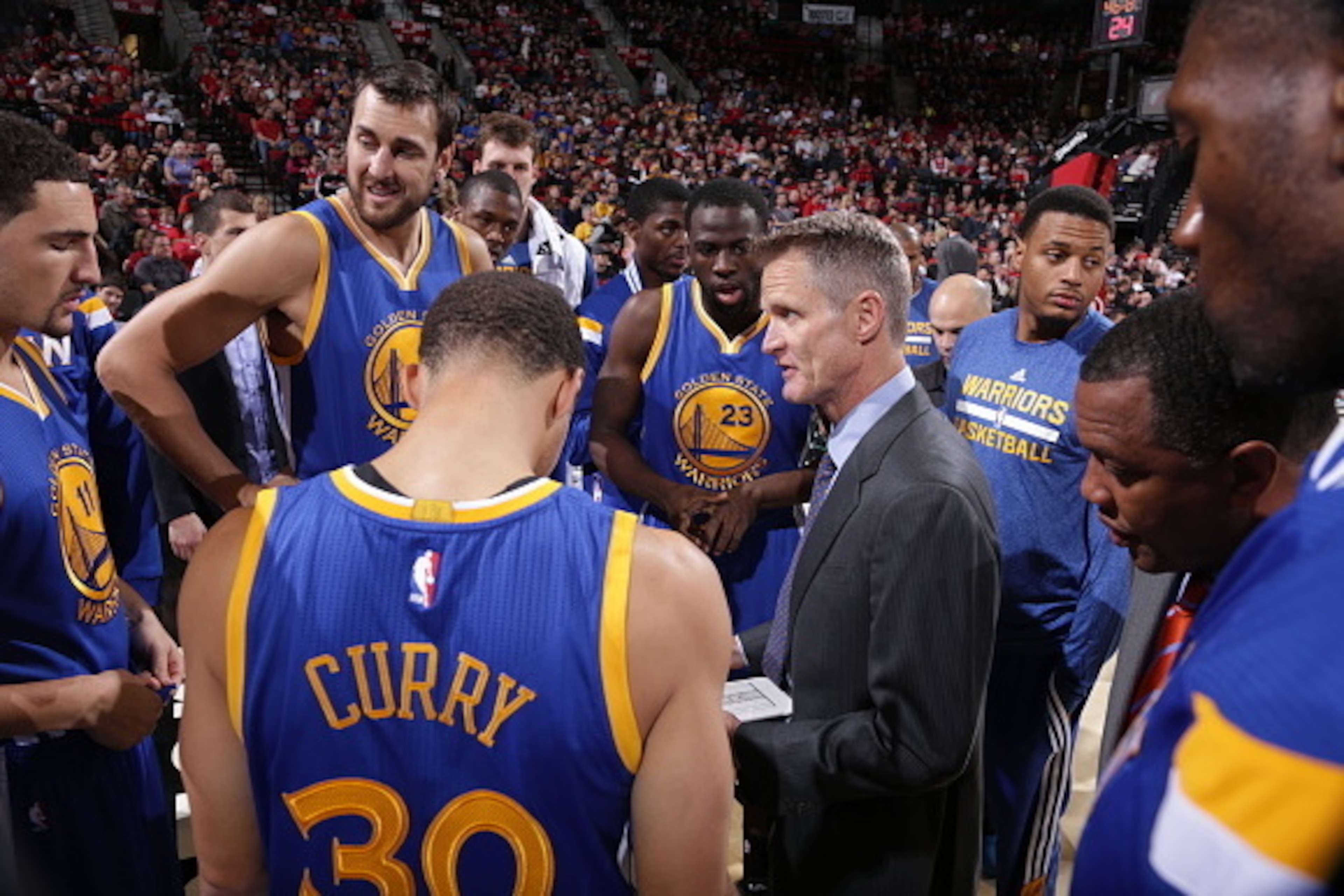 PORTLAND, OR - NOVEMBER 2: Steve Kerr of the Golden State Warriors talks with his team during the game against the Portland Trail Blazers on November 2, 2014 at the Moda Center Arena in Portland, Oregon. NOTE TO USER: User expressly acknowledges and agre PORTLAND, OR - NOVEMBER 2: Steve Kerr of the Golden State Warriors talks with his team during the game against the Portland Trail Blazers on November 2, 2014 at the Moda Center Arena in Portland, Oregon. NOTE TO USER: User expressly acknowledges and agre