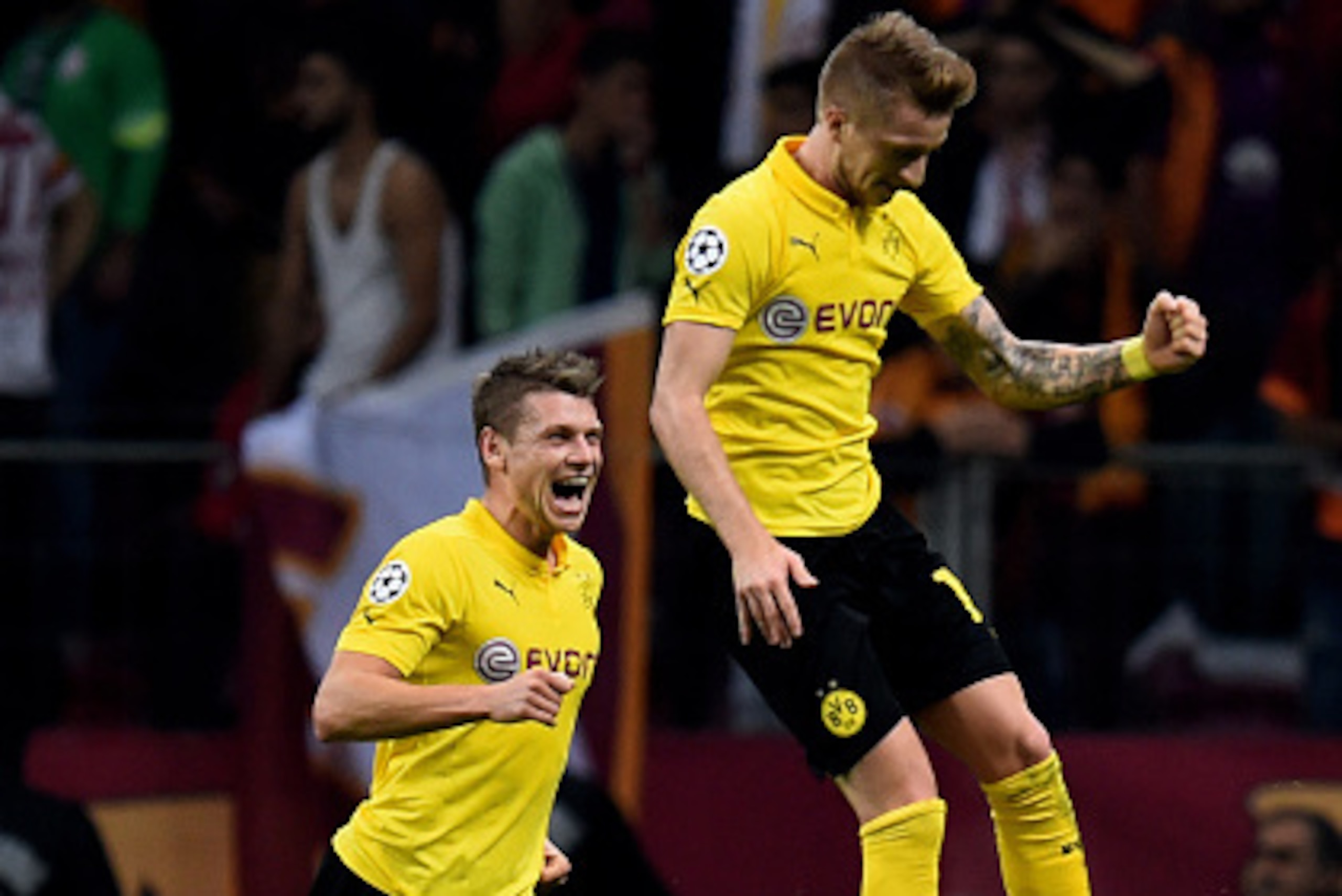 ISTANBUL, TURKEY - OCTOBER 22: Marco Reus (R) of Borussia Dortmund celerates after scoring his team's third goal during UEFA Champions League Group D match between Galatasaray and Borussia Dortmund at Turk Telekom Arena on October 22, 2014 in Istanbul, T ISTANBUL, TURKEY - OCTOBER 22: Marco Reus (R) of Borussia Dortmund celerates after scoring his team's third goal during UEFA Champions League Group D match between Galatasaray and Borussia Dortmund at Turk Telekom Arena on October 22, 2014 in Istanbul, T