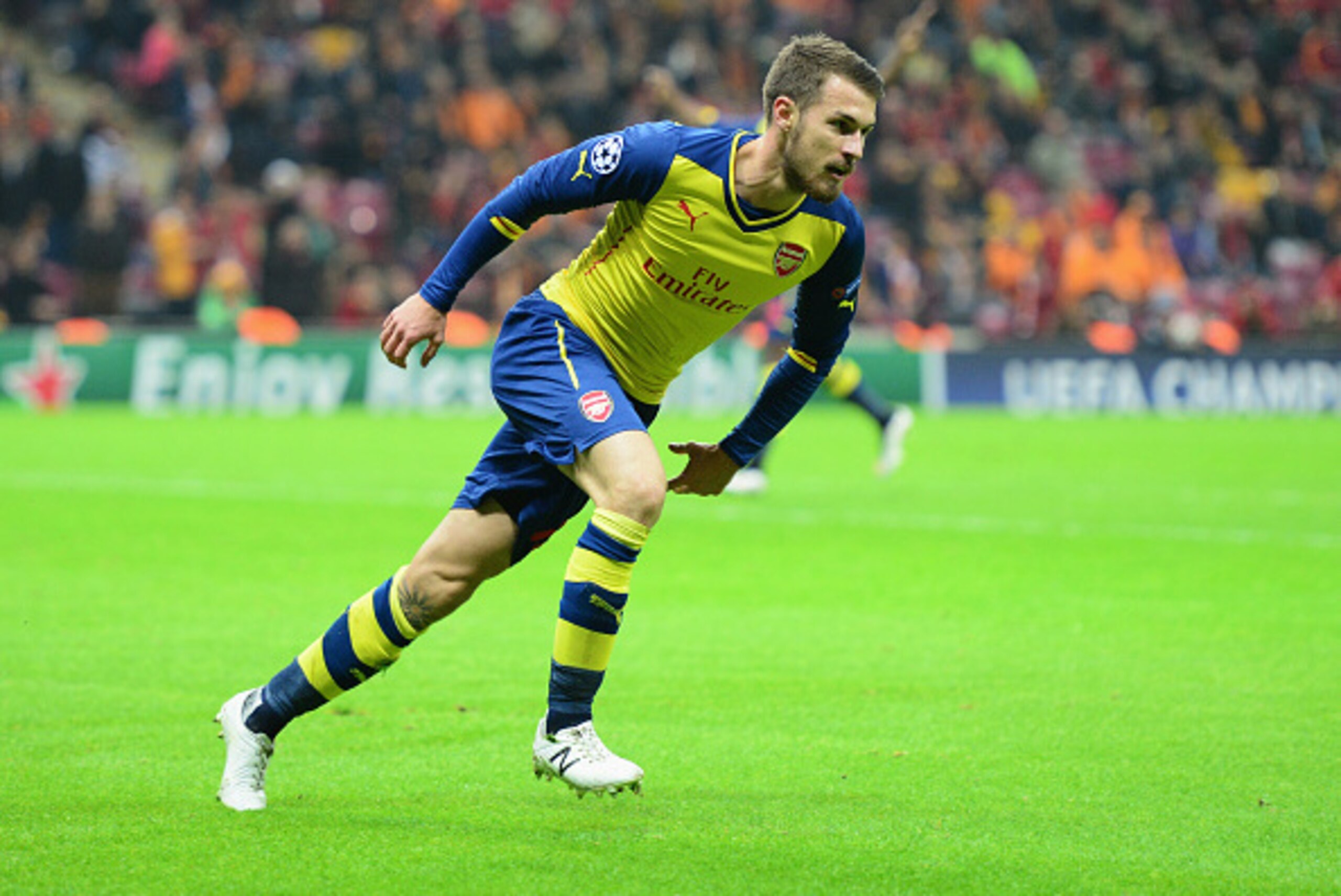 ISTANBUL, TURKEY - DECEMBER 09:  Aaron Ramsey of Arsenal celebrates as he scores their second goal during the UEFA Champions League Group D match between Galatasaray AS and Arsenal FC at Ali Sami Yen Arena on December 9, 2014 in Istanbul, Turkey.  (Photo 