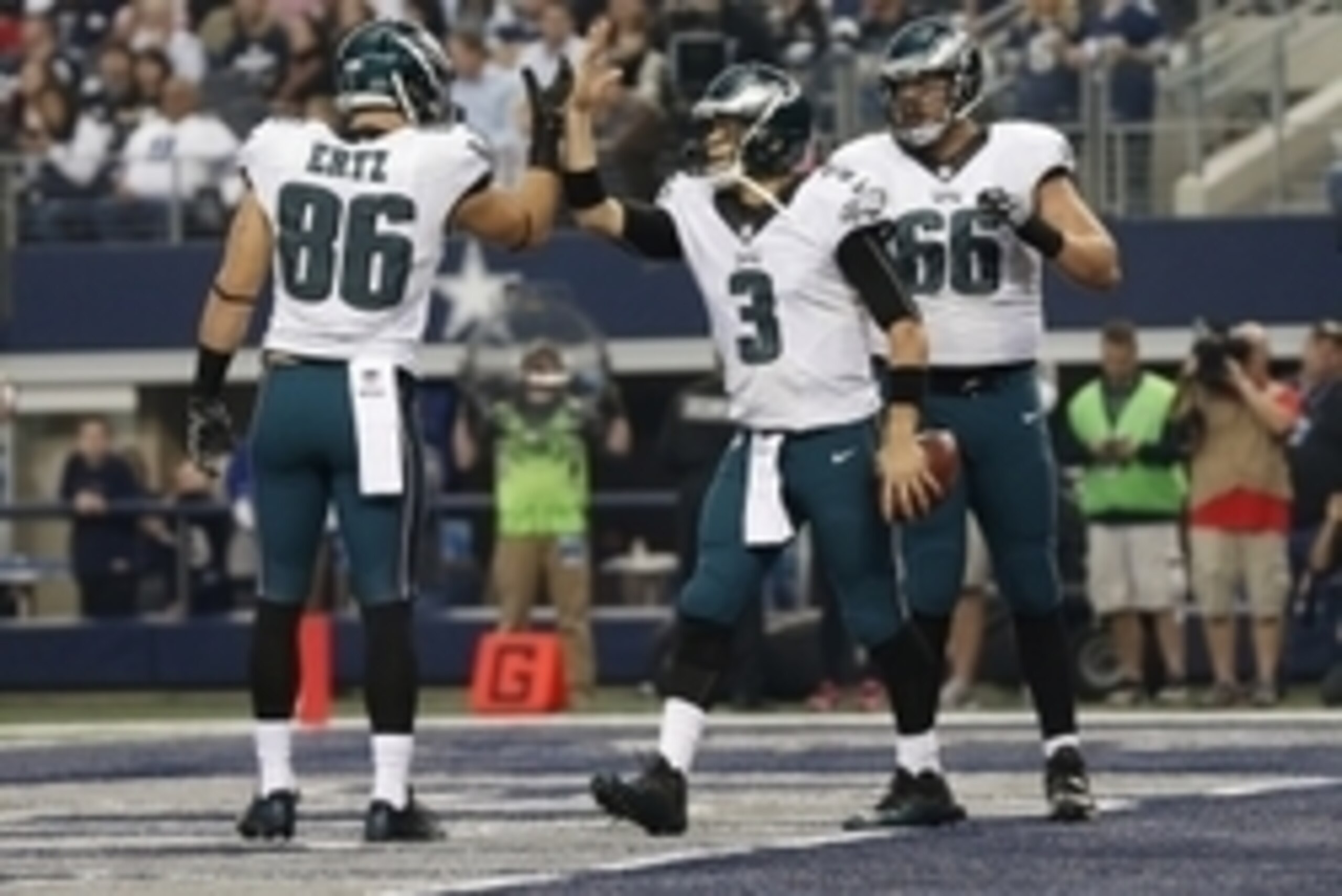 Nov 27, 2014; Arlington, TX, USA; Philadelphia Eagles quarterback Mark Sanchez (3) celebrates a touchdown in the first quarter with tight end Zach Ertz (86) against the Dallas Cowboys at AT&T Stadium. Mandatory Credit: Matthew Emmons-USA TODAY Sports