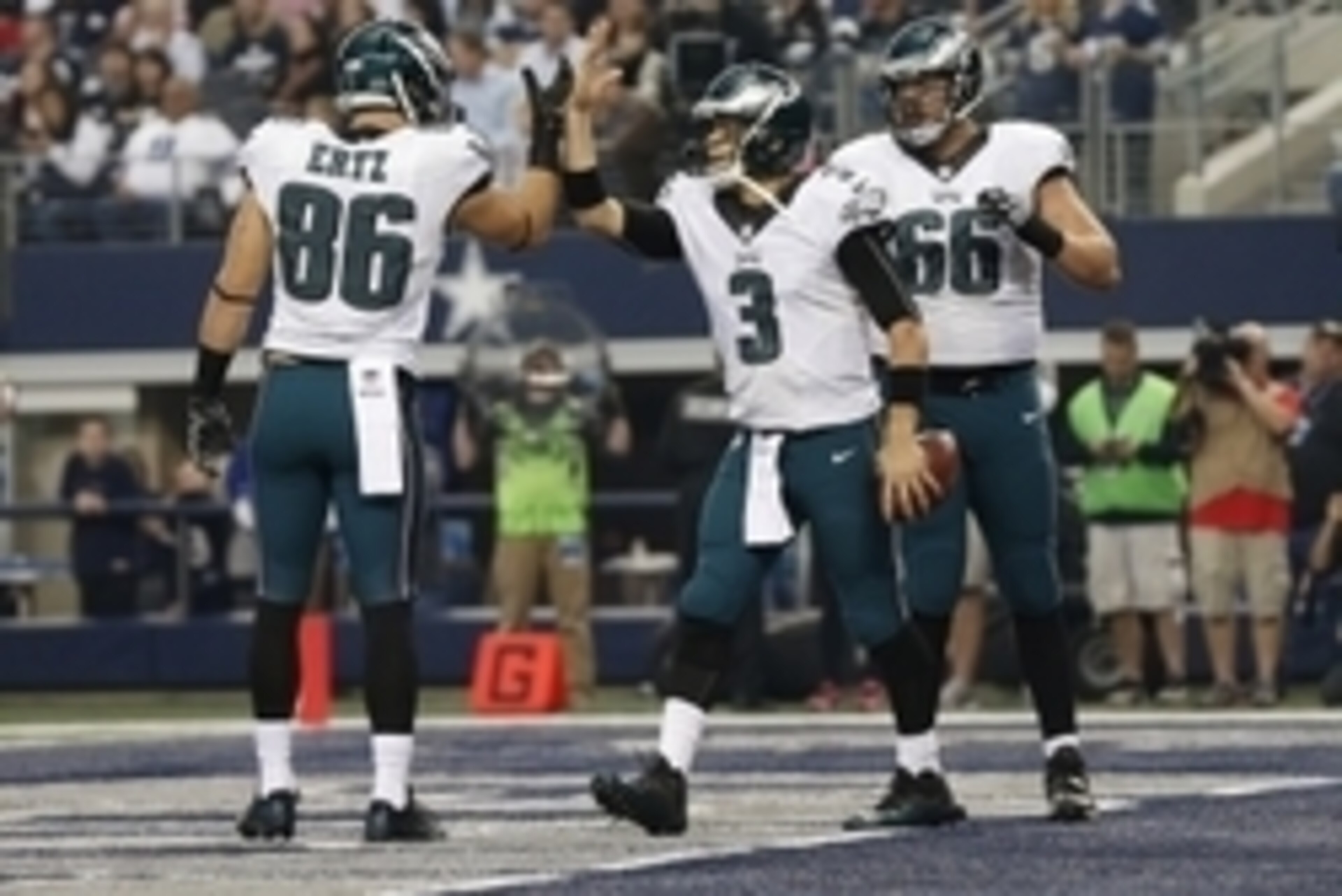Nov 27, 2014; Arlington, TX, USA; Philadelphia Eagles quarterback Mark Sanchez (3) celebrates a touchdown in the first quarter with tight end Zach Ertz (86) against the Dallas Cowboys at AT&T Stadium. Mandatory Credit: Matthew Emmons-USA TODAY Sports