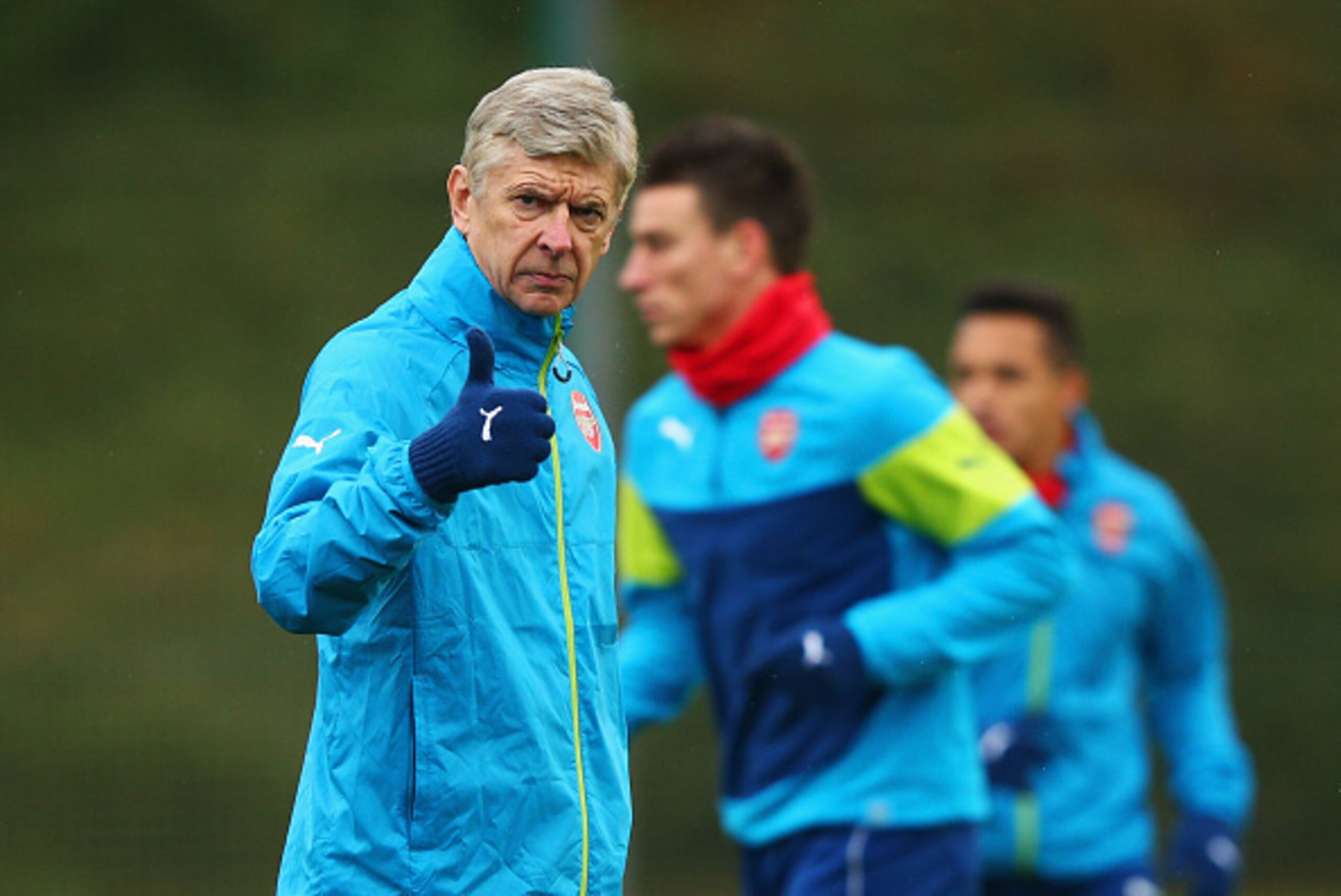 ST ALBANS, ENGLAND - NOVEMBER 25:  Arsene Wenger manager of Arsenal gives a thumbs up during an Arsenal training session, ahead of the UEFA Champions League Group D match against Borussia Dortmund, at London Colney on November 25, 2014 in St Albans, Engla